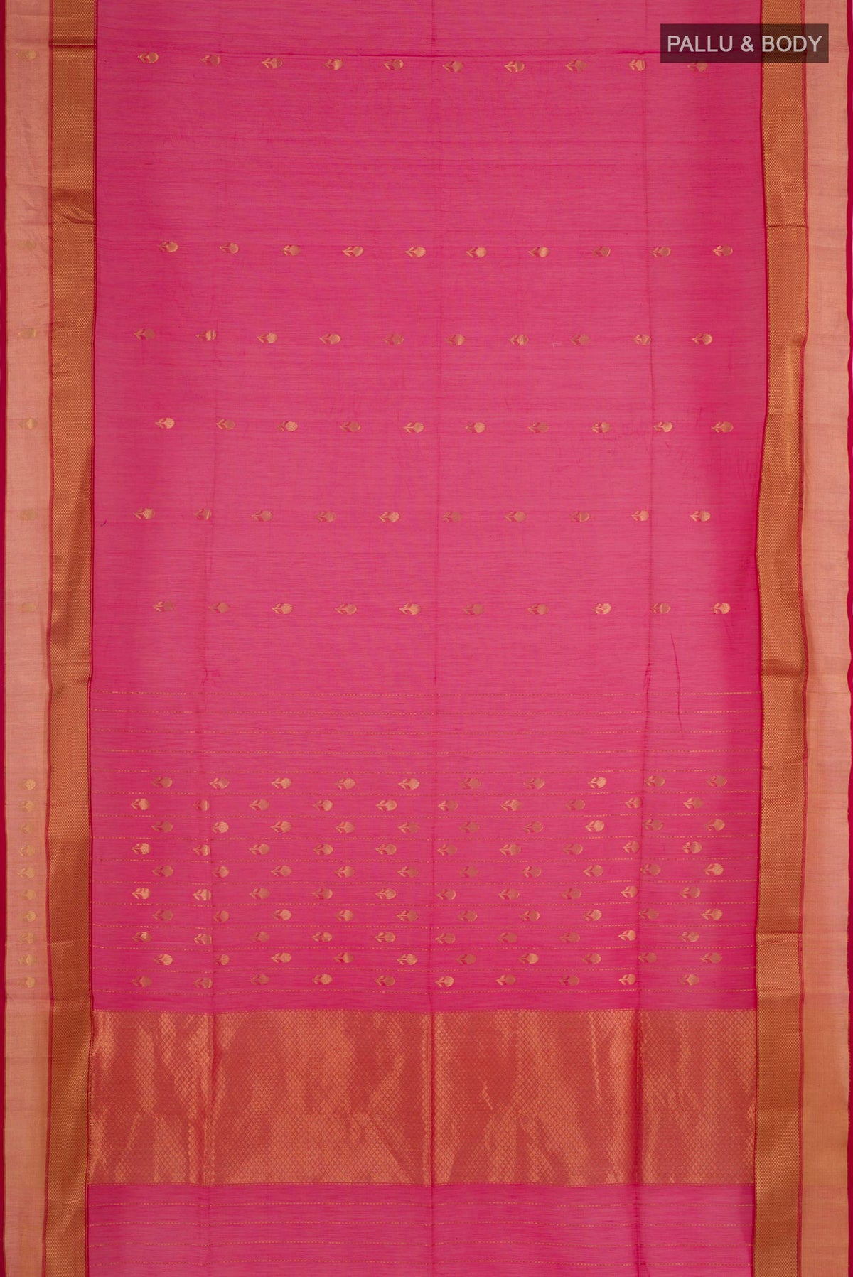 Flat view of Rani Pink Blended Kora Cotton Saree with Zari Butta on the body and Zari Border. 