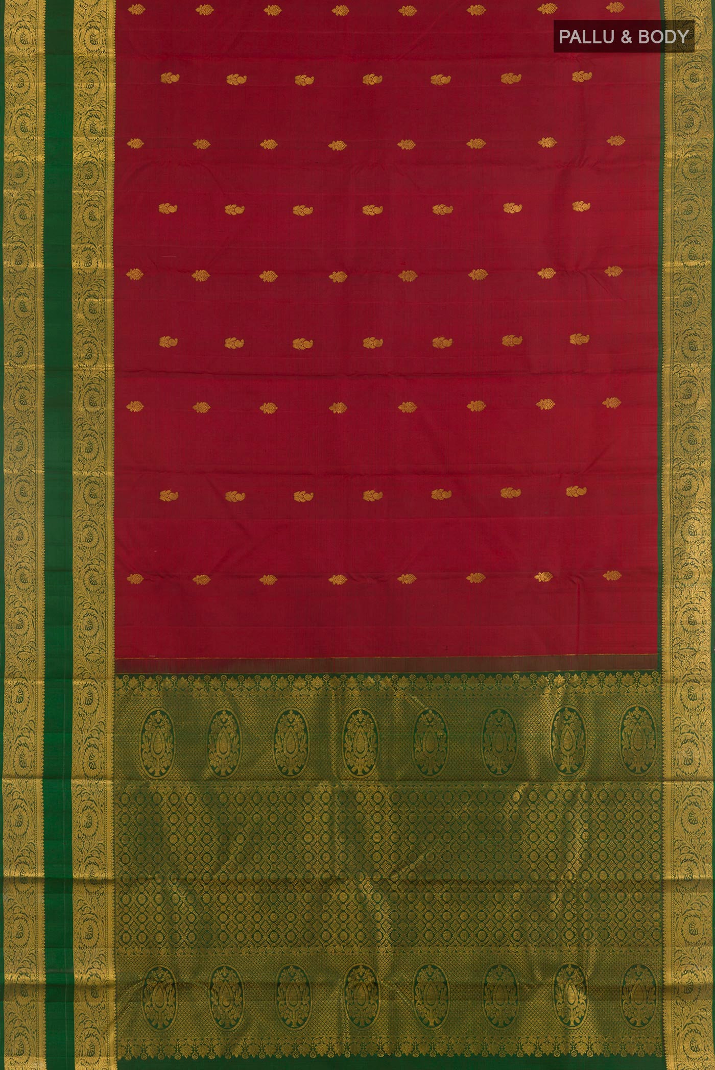 Flat view of Maroon Kanchipuram Silk Saree with Zari Butta on the body and Zari Border. 