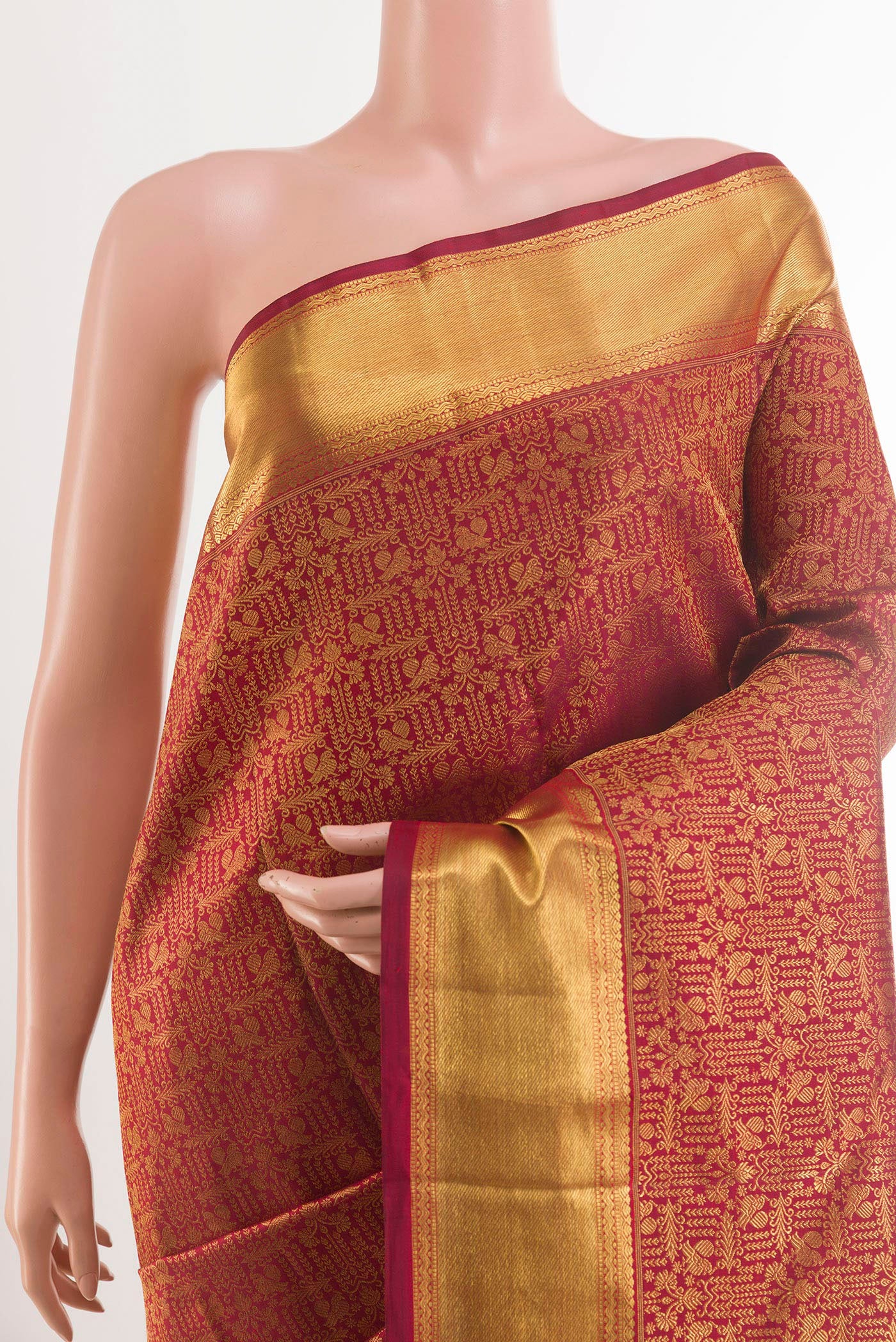 Border image of Maroon Kanchipuram Silk Saree with Zari Brocade on the body and Zari Border. 