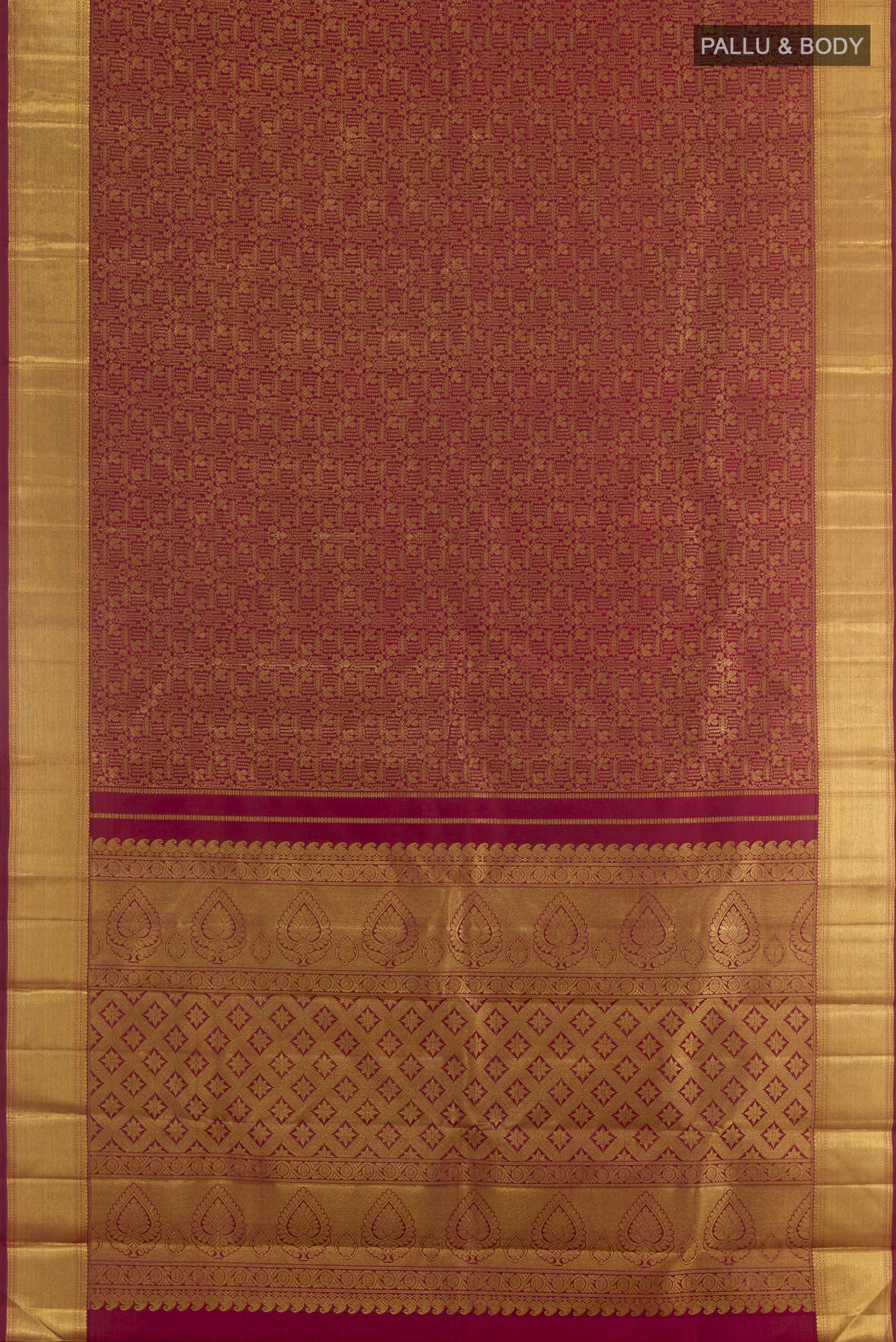 Flat view of Maroon Kanchipuram Silk Saree with Zari Brocade on the body and Zari Border. 