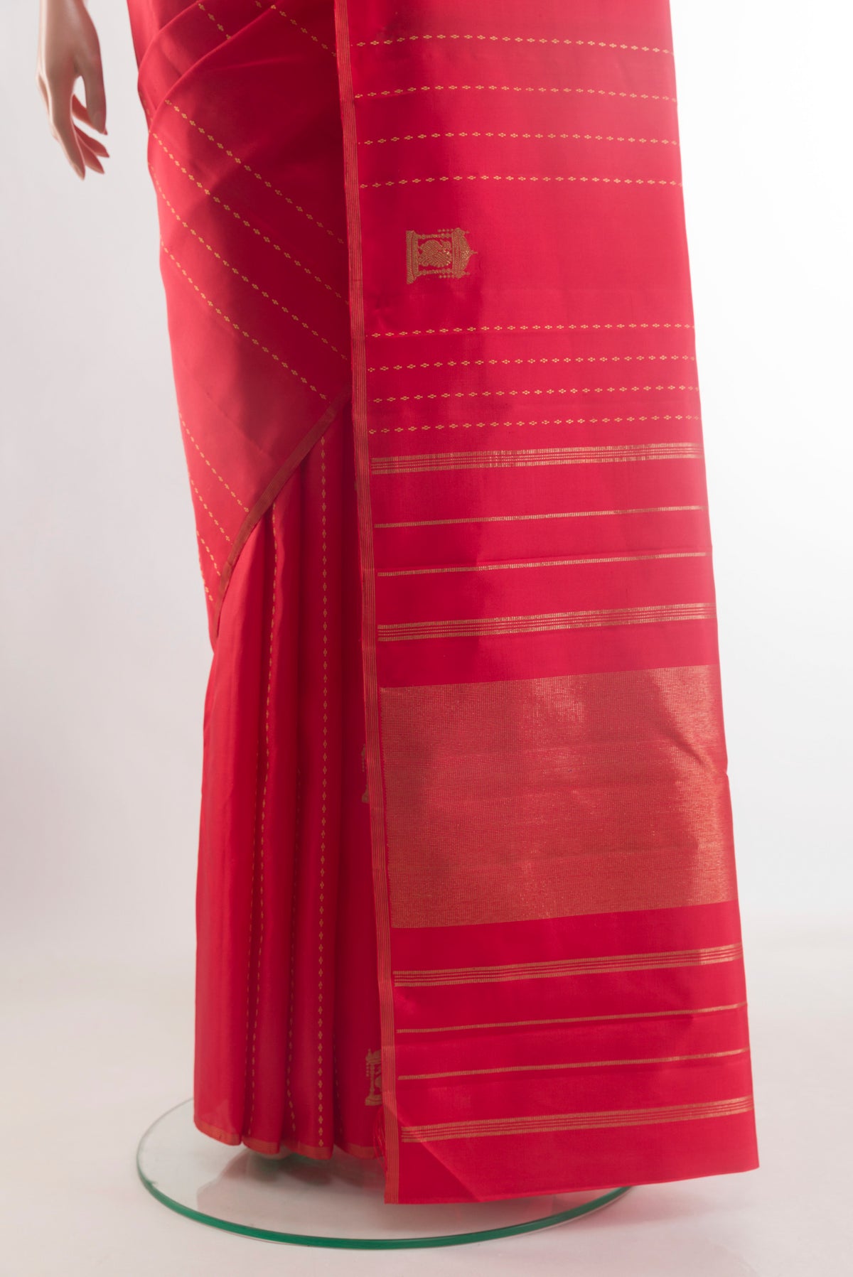 Pleats and pallu of Red Kanjivaram Silk Saree with Stripes on the body and Without Border. 