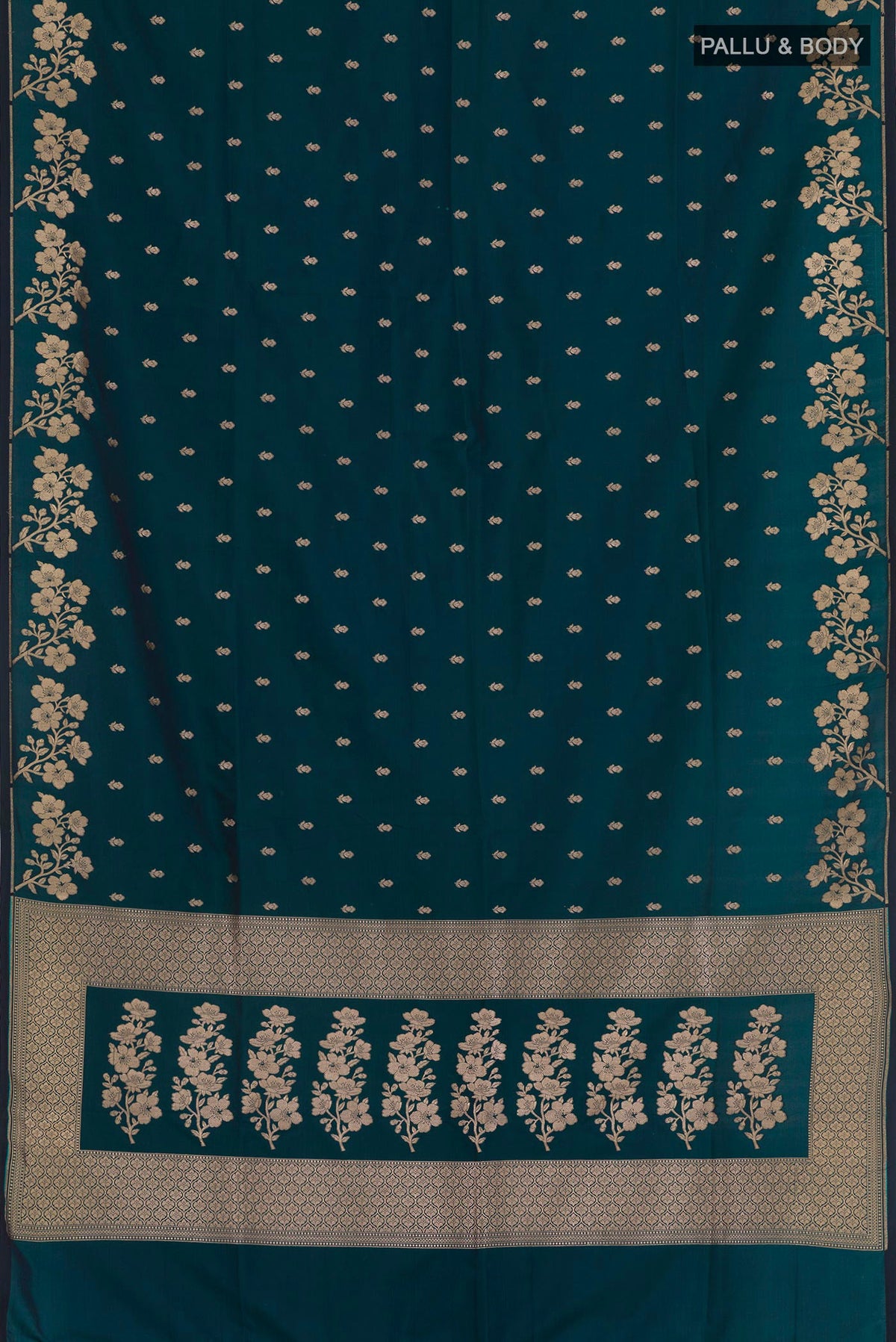 Flat view of Teal Blended Art Silk Saree with Zari Butta on the body and Zari Border. 