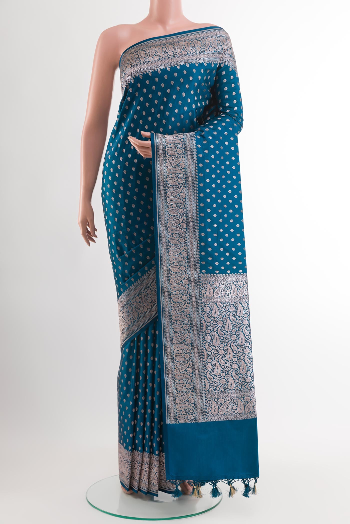 Blue Blended Art Silk Saree with Zari Butta on the body and Zari Border.  displayed on a mannequin