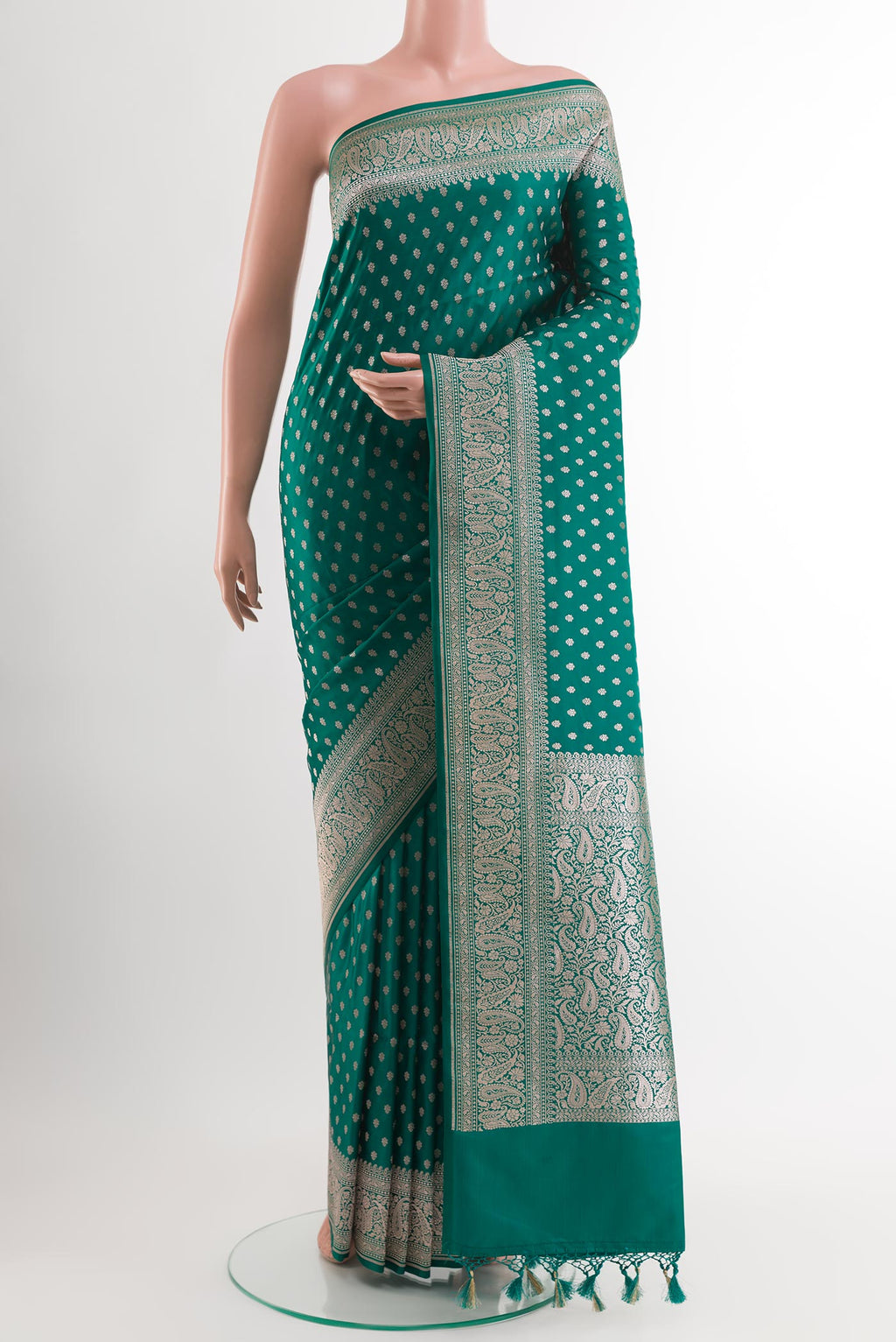 Sea Green Blended Art Silk Saree with Zari Butta on the body and Zari Border.  displayed on a mannequin