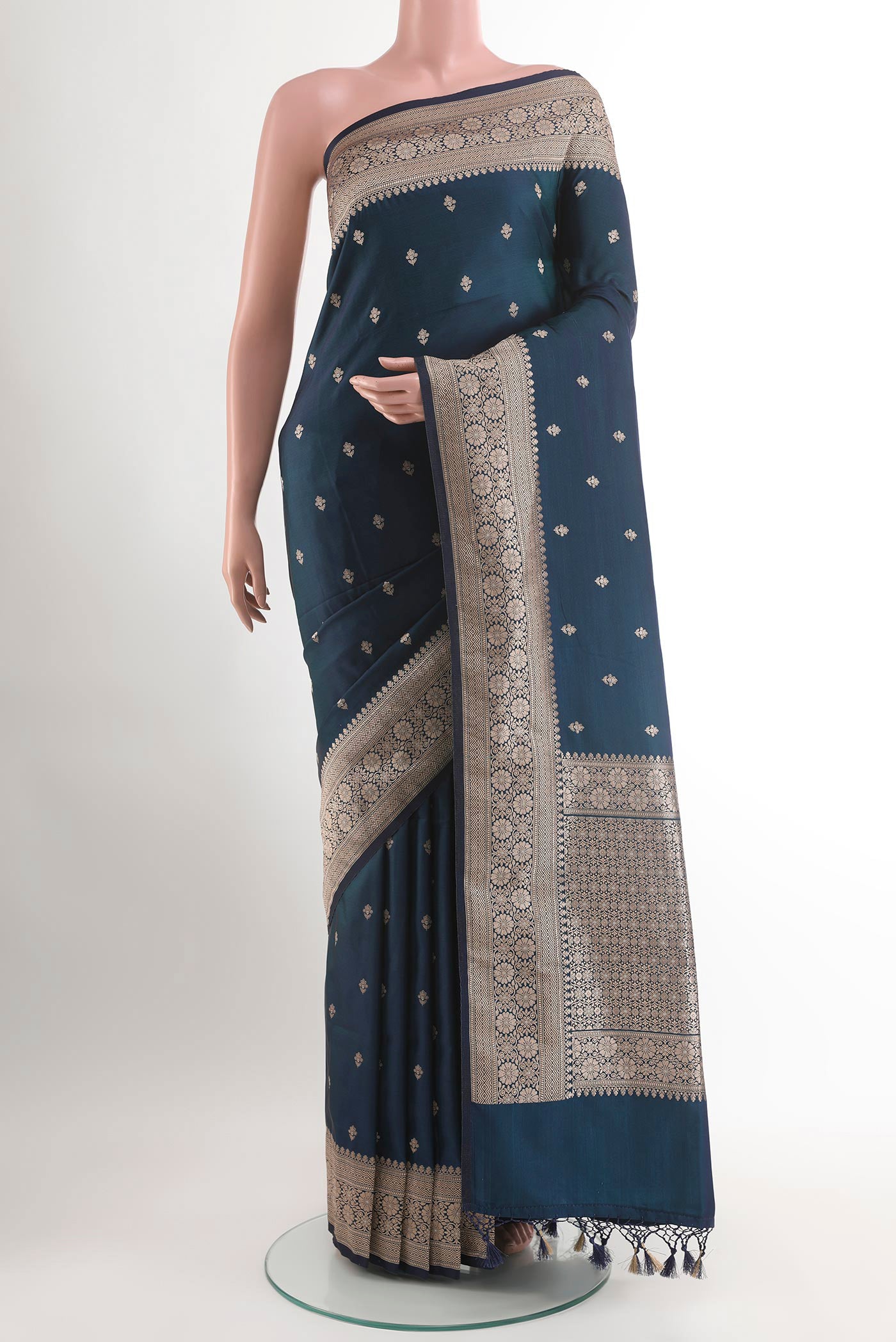 Blue Blended Art Silk Saree with Zari Butta on the body and Zari Border.  displayed on a mannequin