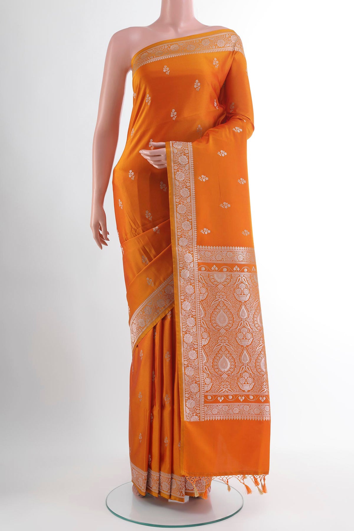 Yellow Blended Art Silk Saree with Zari Butta on the body and Zari Border.  displayed on a mannequin