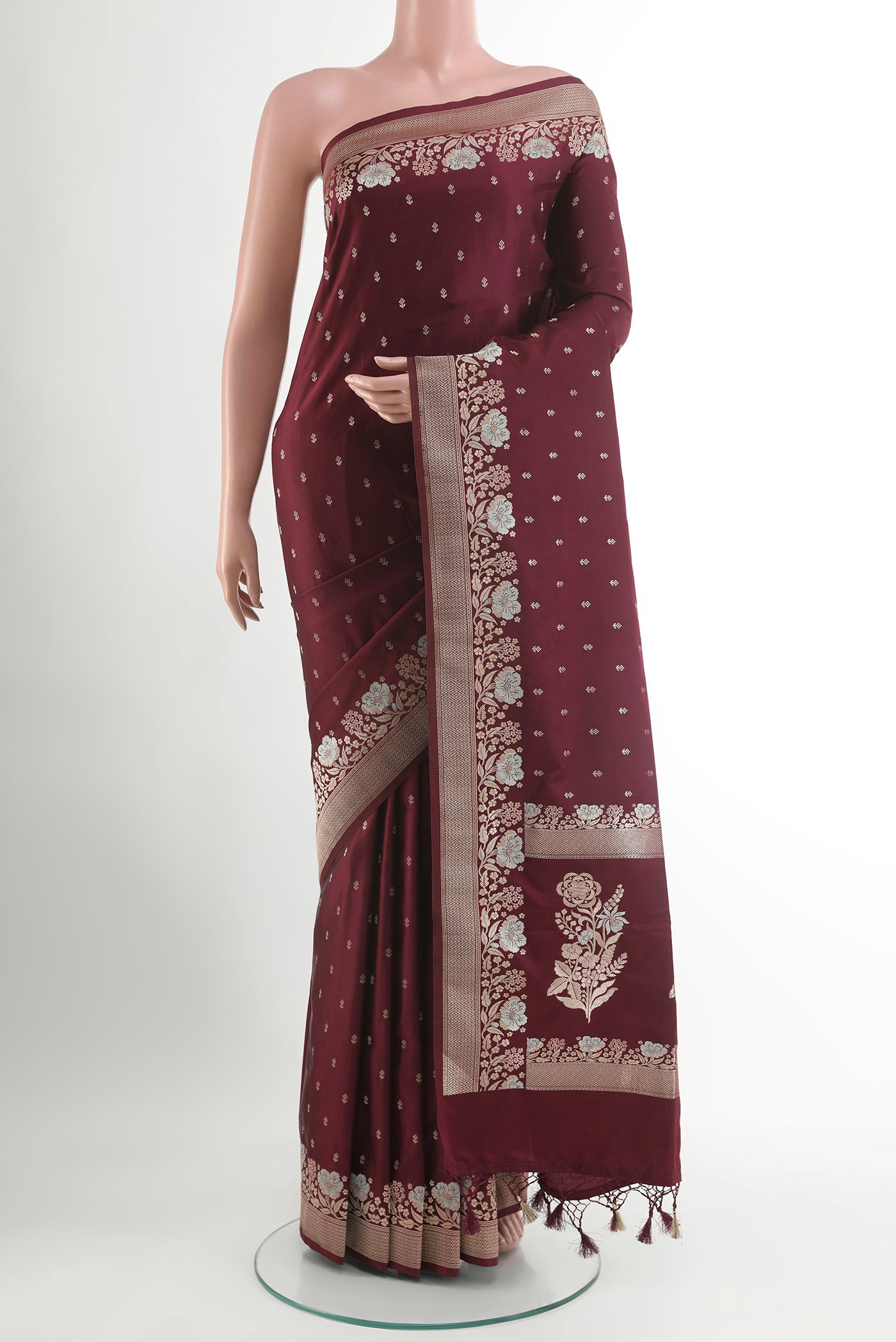 Purple Blended Art Silk Saree with Zari Butta on the body and Zari Border.  displayed on a mannequin