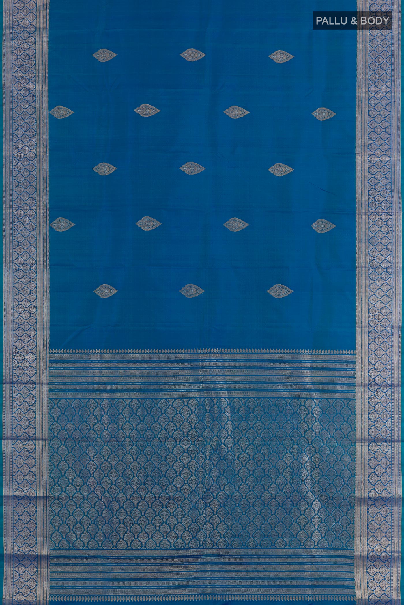 Flat view of Blue Dual Tone Kanchipuram Silk Saree with Zari Butta on the body and Zari Border. 