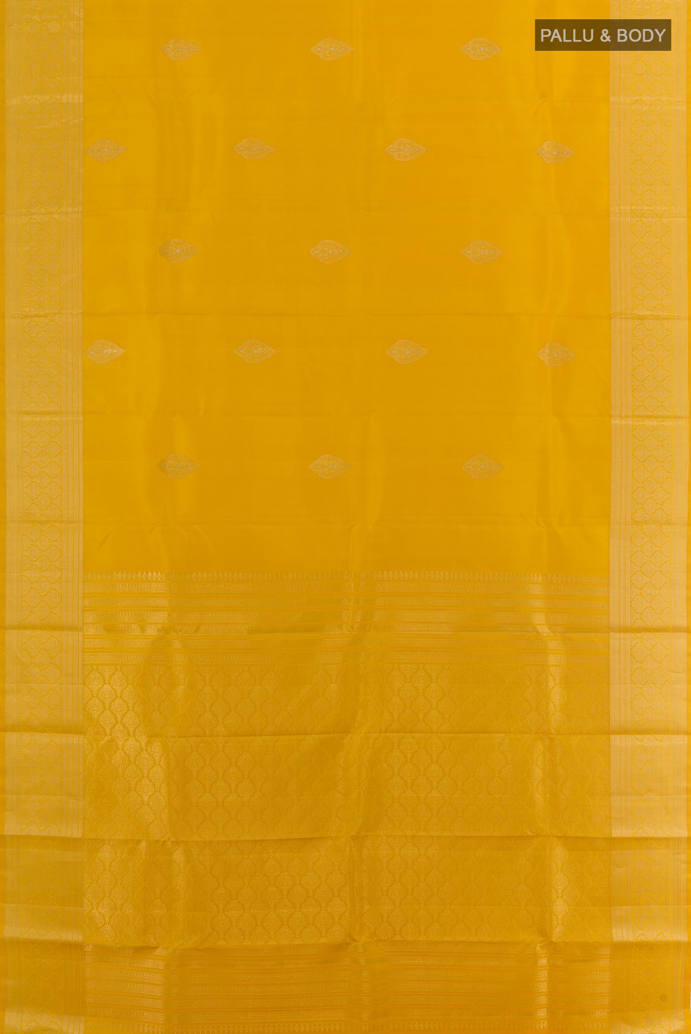 Flat view of Yellow Kanchipuram Silk Saree with Zari Butta on the body and Zari Border. 