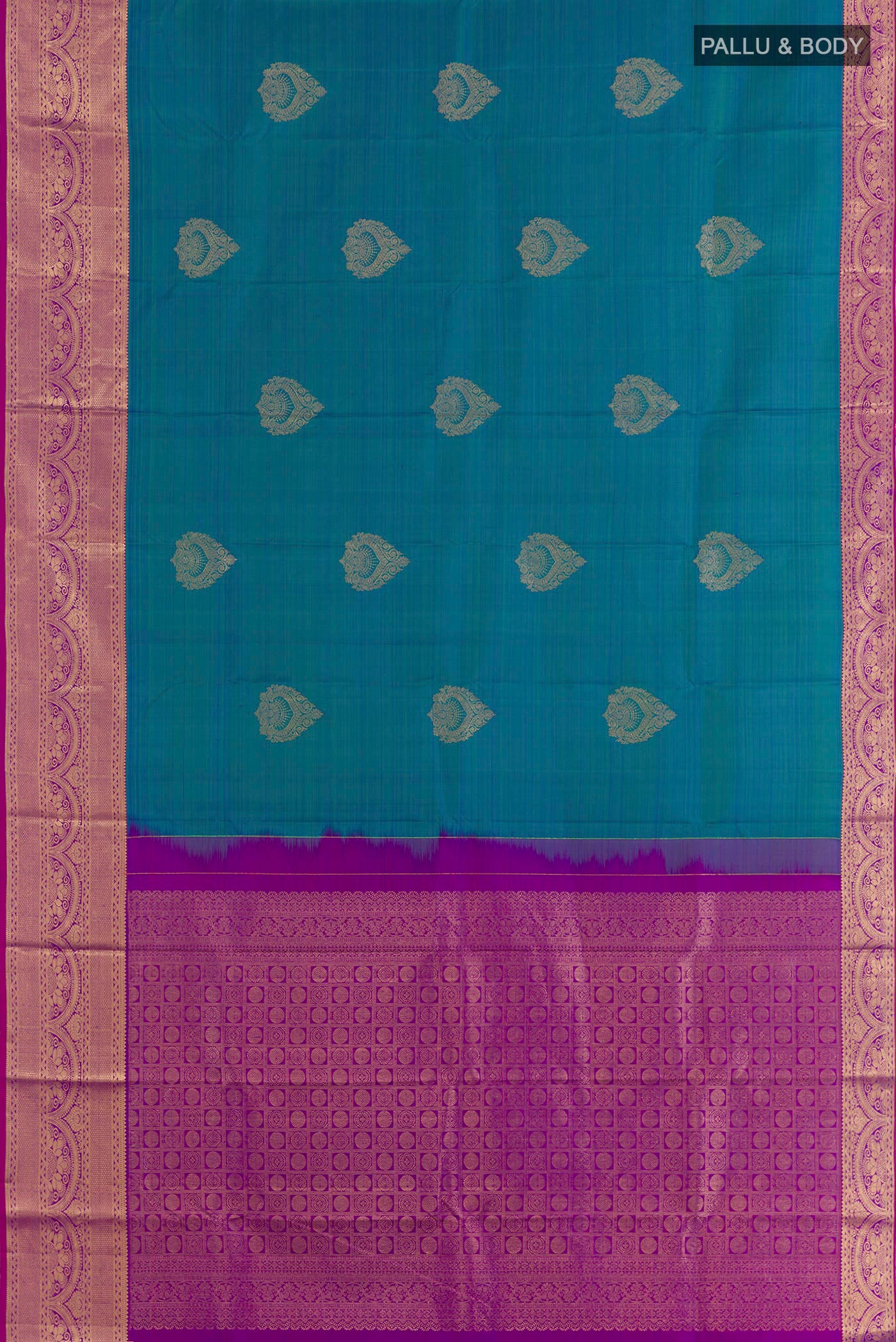 Flat view of Peacock Blue Kanchipuram Silk Saree with Zari Butta on the body and Zari Border. 