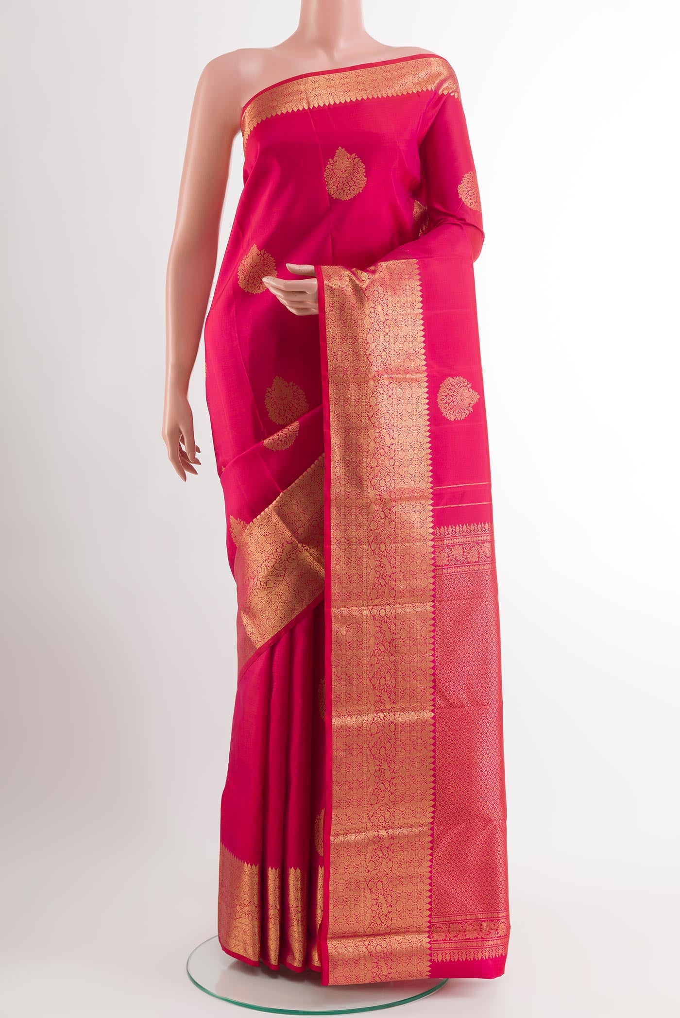 Red Dual Tone Kanchipuram Silk Saree with Zari Butta on the body and Zari Border.  displayed on a mannequin