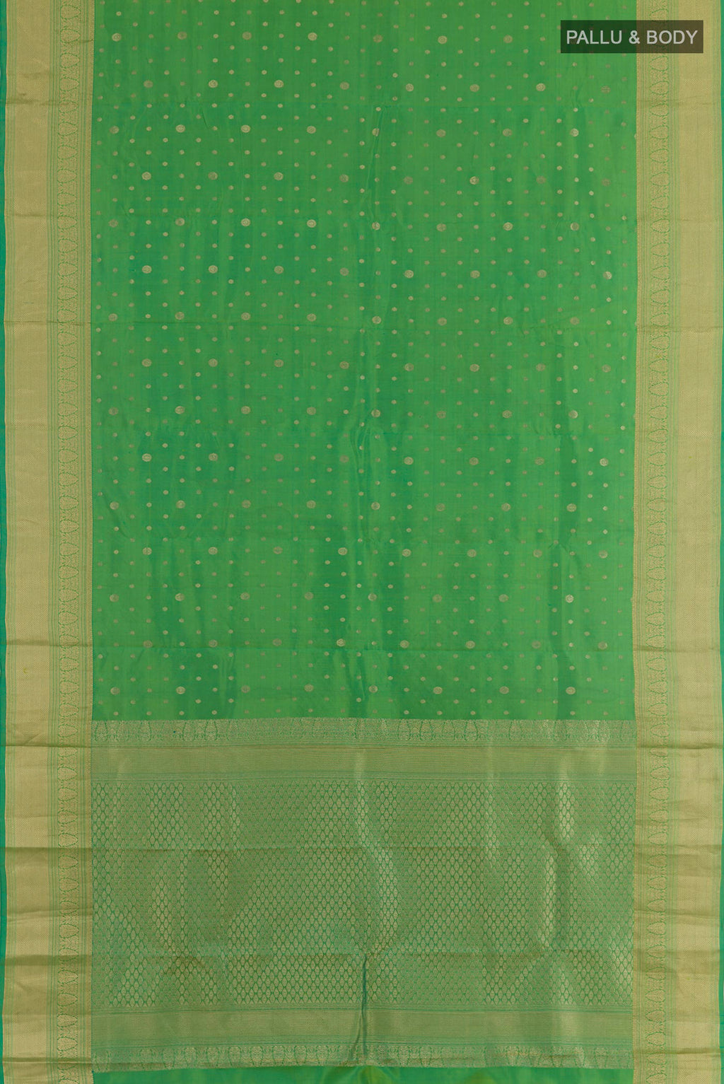 Flat view of Green Dual Tone Kanjivaram Silk Saree with Zari Butta on the body and Zari Border. 