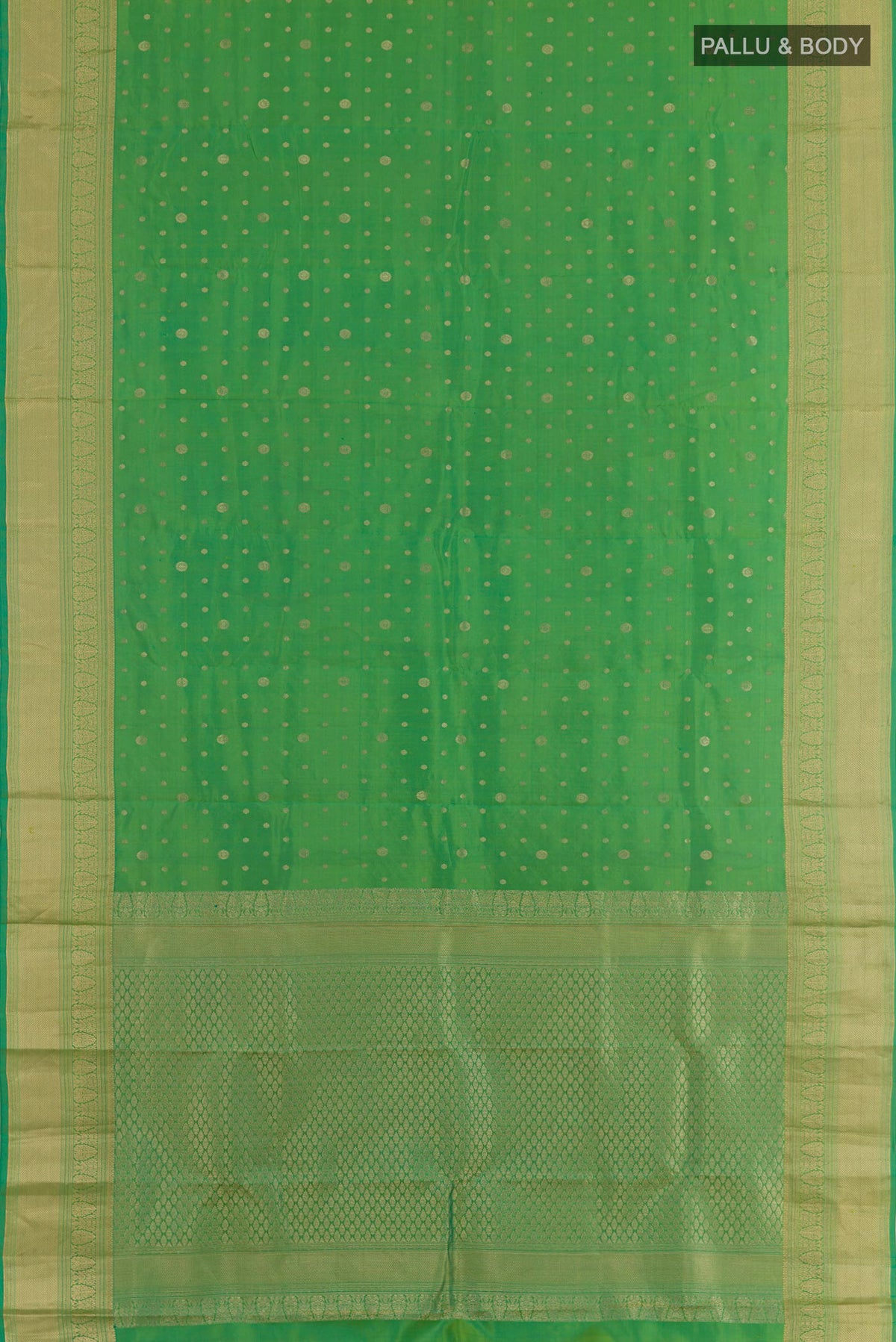 Flat view of Green Dual Tone Kanjivaram Silk Saree with Zari Butta on the body and Zari Border. 