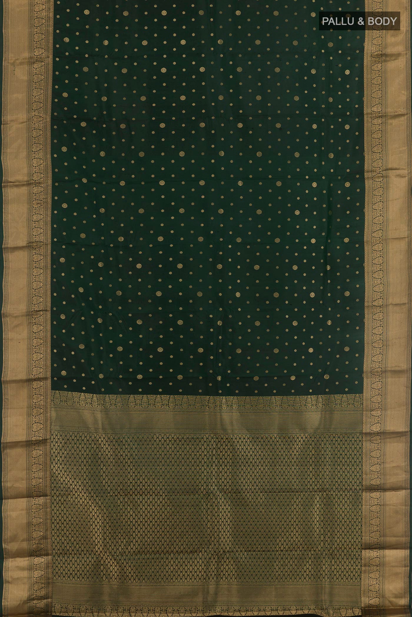 Flat view of Bottle Green Kanjivaram Silk Saree with Zari Butta on the body and Zari Border. 