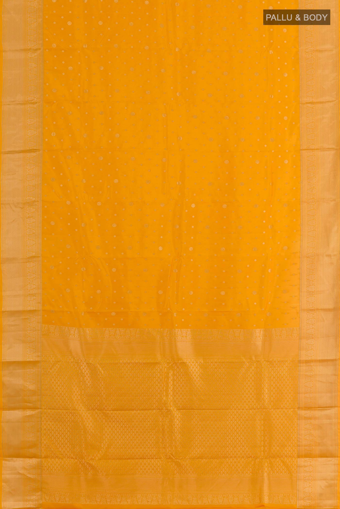 Flat view of Yellow Kanjivaram Silk Saree with Zari Butta on the body and Zari Border. 