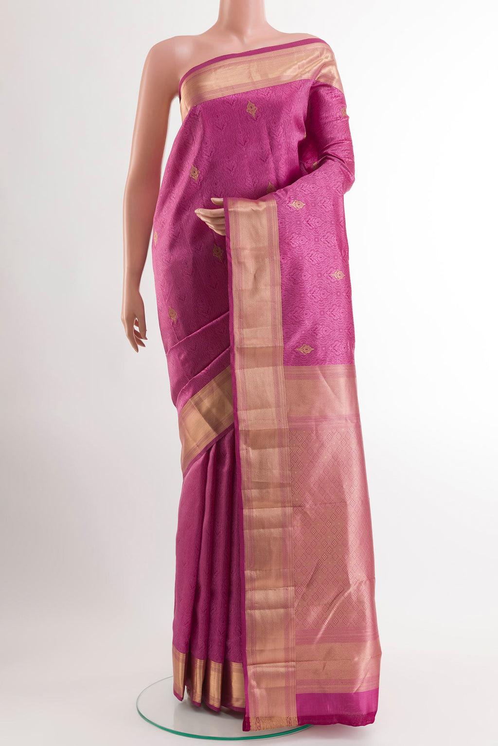 Lavender Kanjivaram Silk Saree with Jacquard With Zari Butta on the body and Temple Border.  displayed on a mannequin