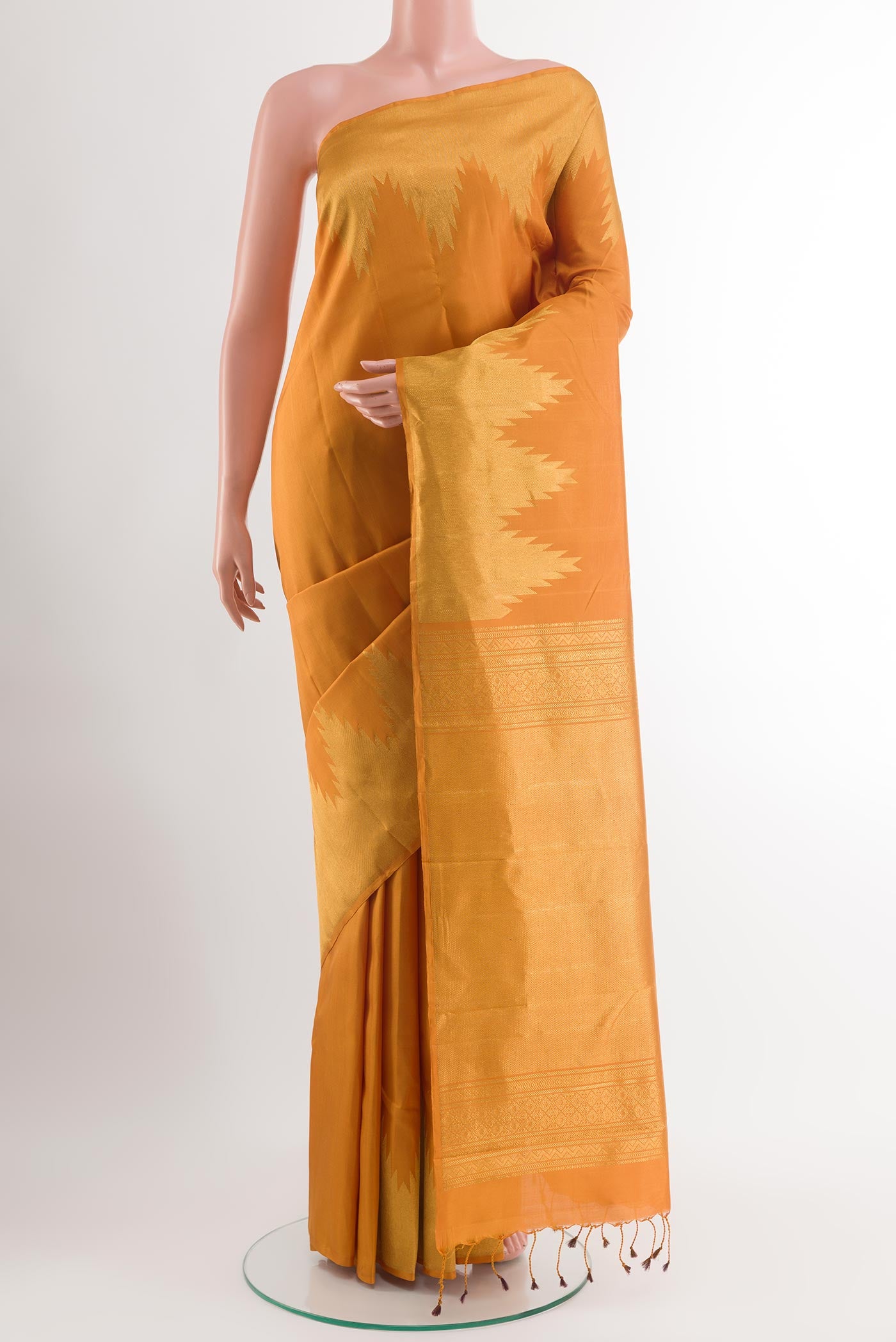 Yellow Dual Tone Kanchipuram Silk Saree with Zari Butta on the body and Temple Border.  displayed on a mannequin