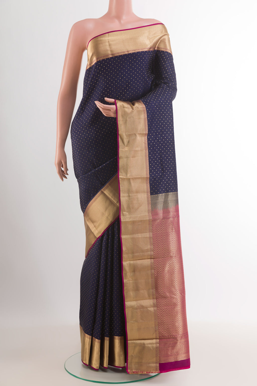 Dark Blue Kanjivaram Silk Saree with Zari Butta on the body and Zari Border.  displayed on a mannequin
