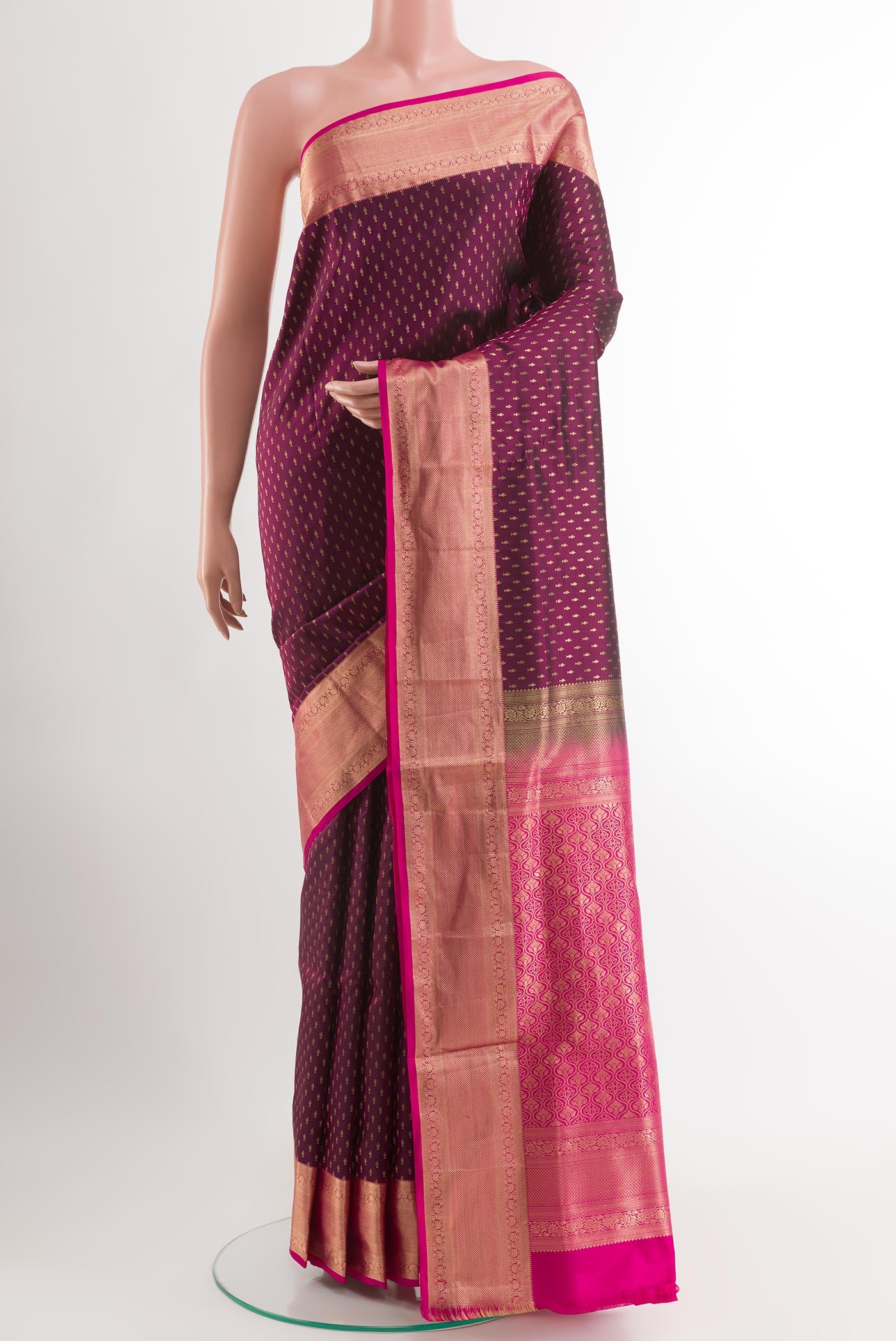 Purple Soft Silk Saree with Zari Butta on the body and Zari Border.  displayed on a mannequin