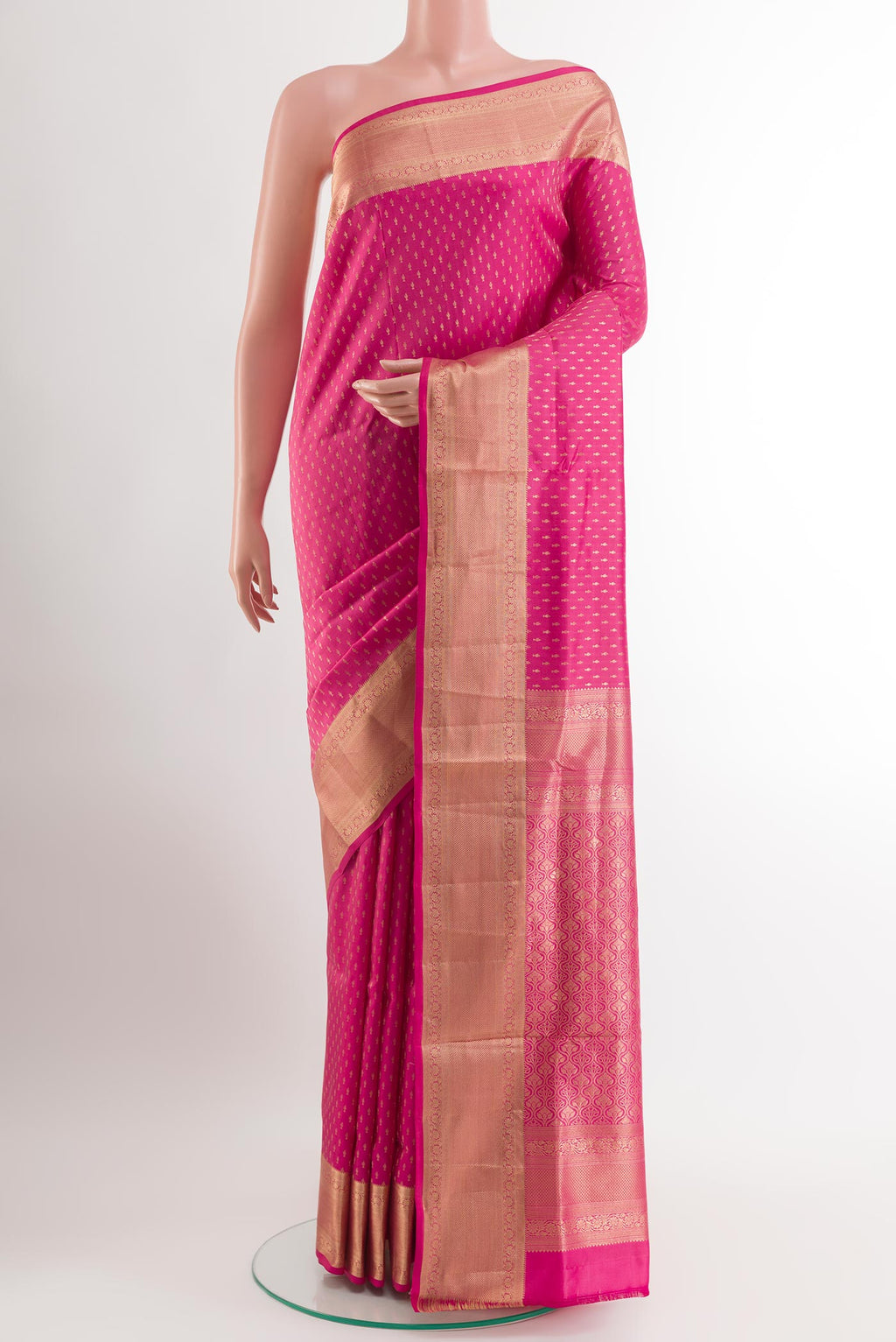 Pink Soft Silk Saree with Zari Butta on the body and Zari Border.  displayed on a mannequin