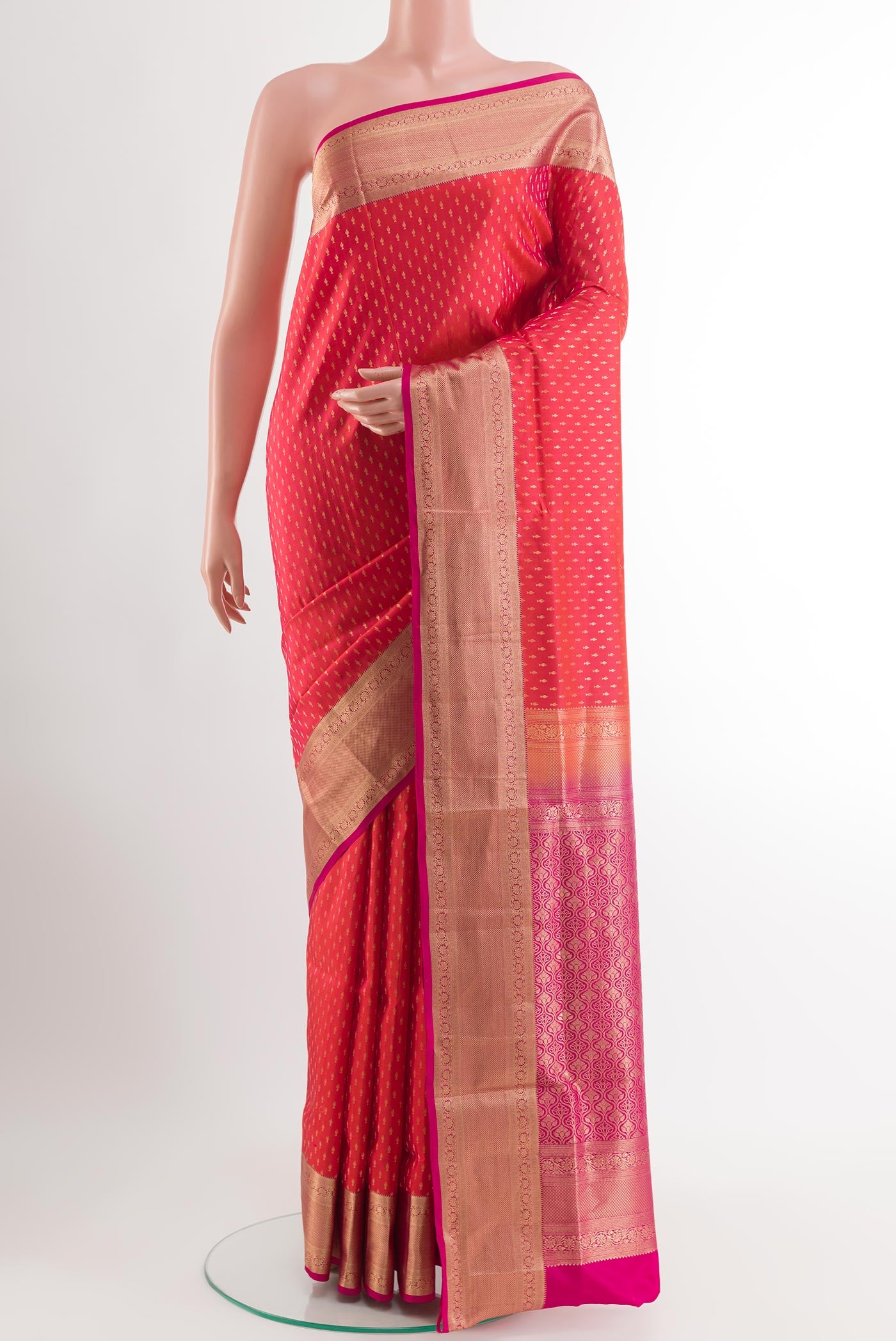 Red Soft Silk Saree with Zari Butta on the body and Zari Border.  displayed on a mannequin