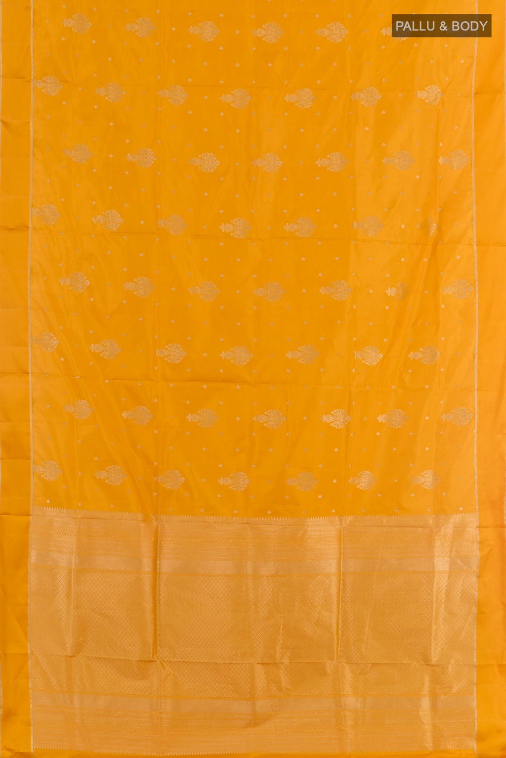 Flat view of Yellow Soft Silk Saree with Zari Butta on the body and Zari Border. 