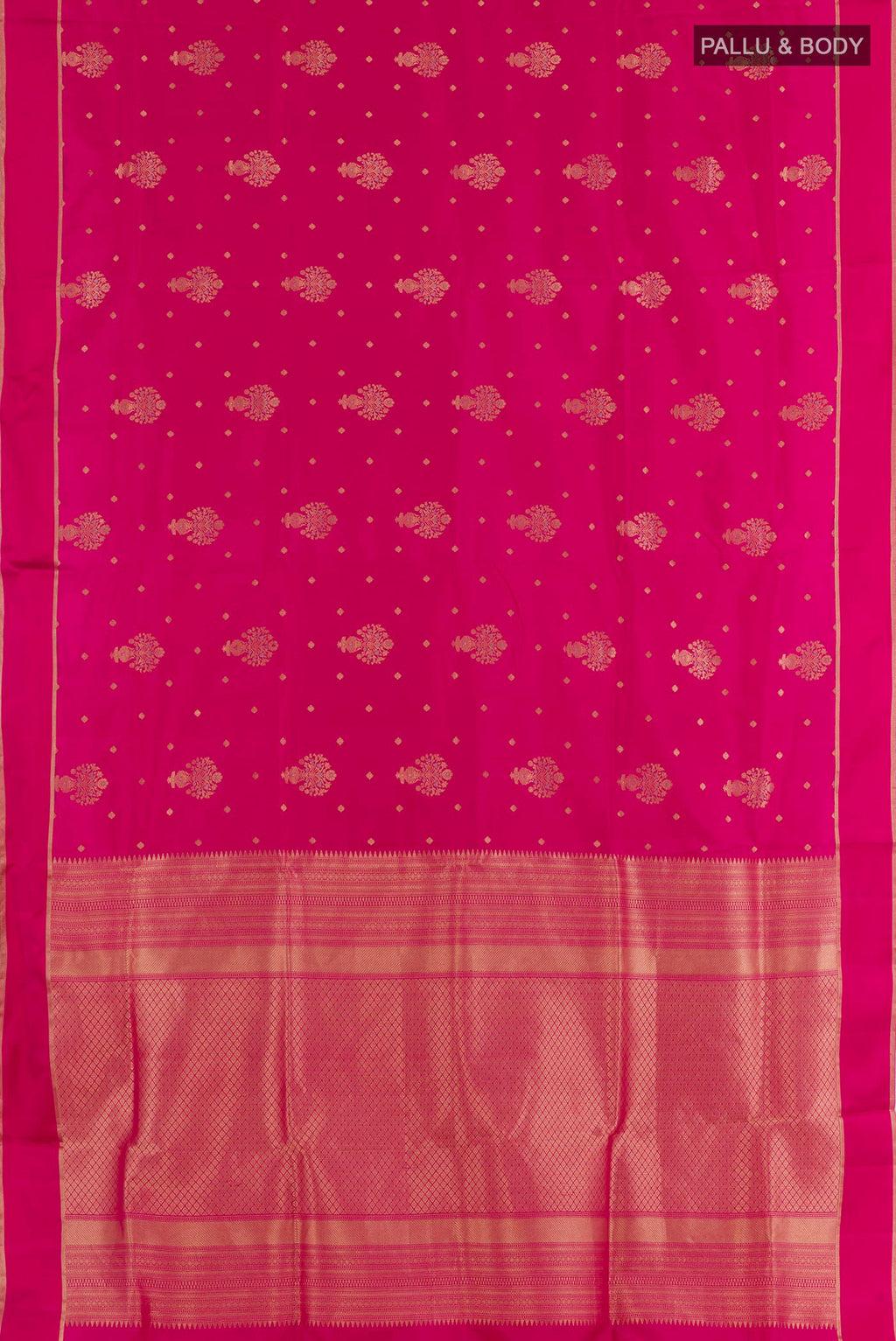 Flat view of Pink Soft Silk Saree with Zari Butta on the body and Zari Border. 