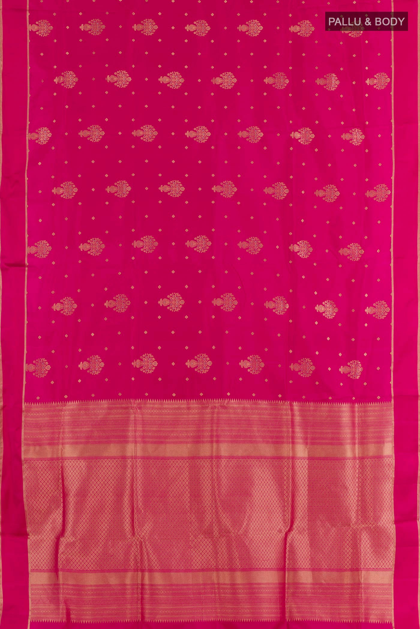 Flat view of Pink Soft Silk Saree with Zari Butta on the body and Zari Border. 
