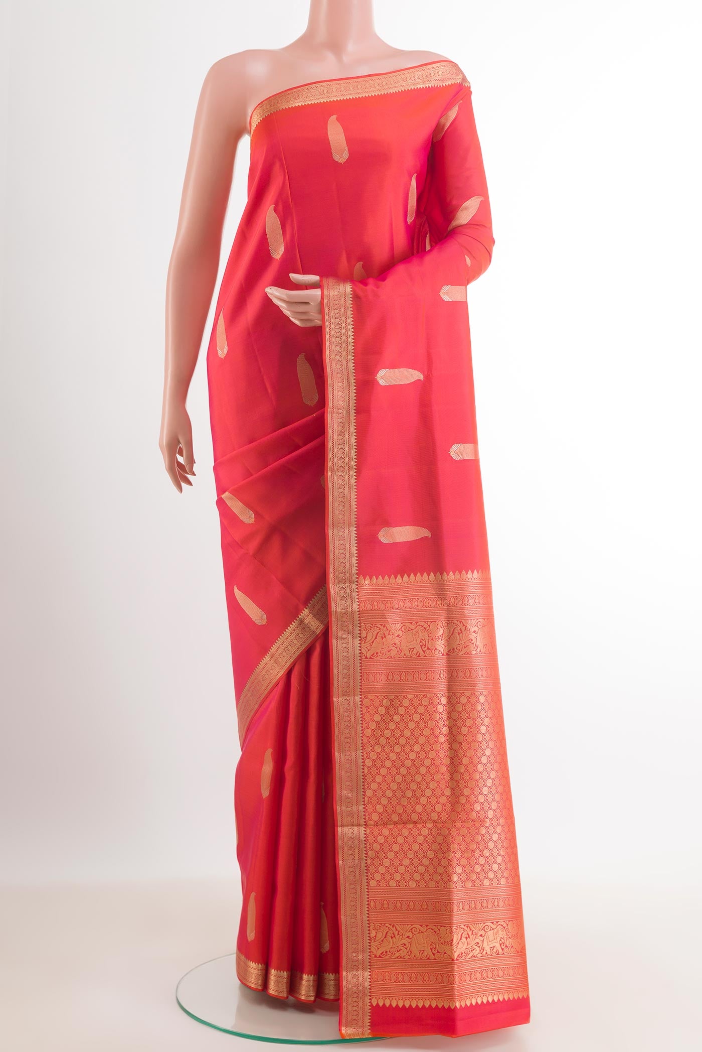 Pink Dual Tone Soft Silk Saree with Zari Butta on the body and Zari Border.  displayed on a mannequin