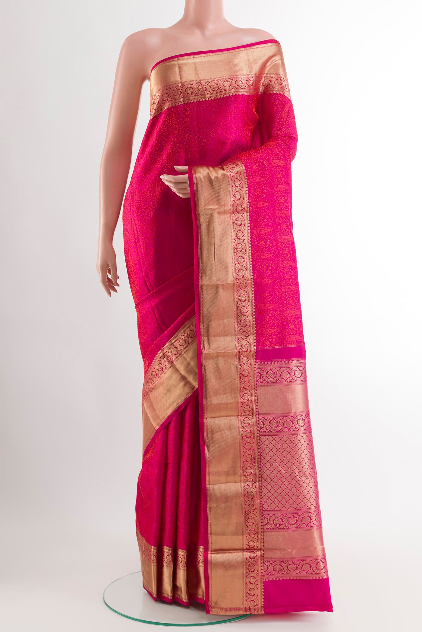Pink Dual Tone Kanchipuram Silk Saree with Jacquard design on the body and Zari Border.  displayed on a mannequin