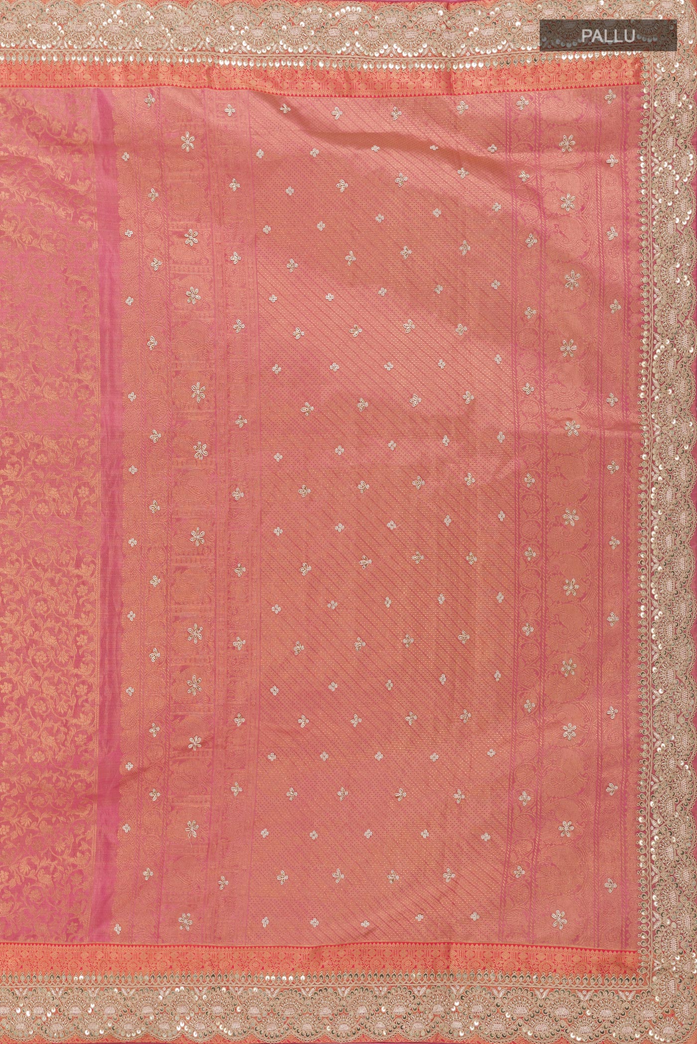 Close up image of the pallu of Pink Tissue Silk Saree with Zari Brocade on the body and Embroidery Border. 