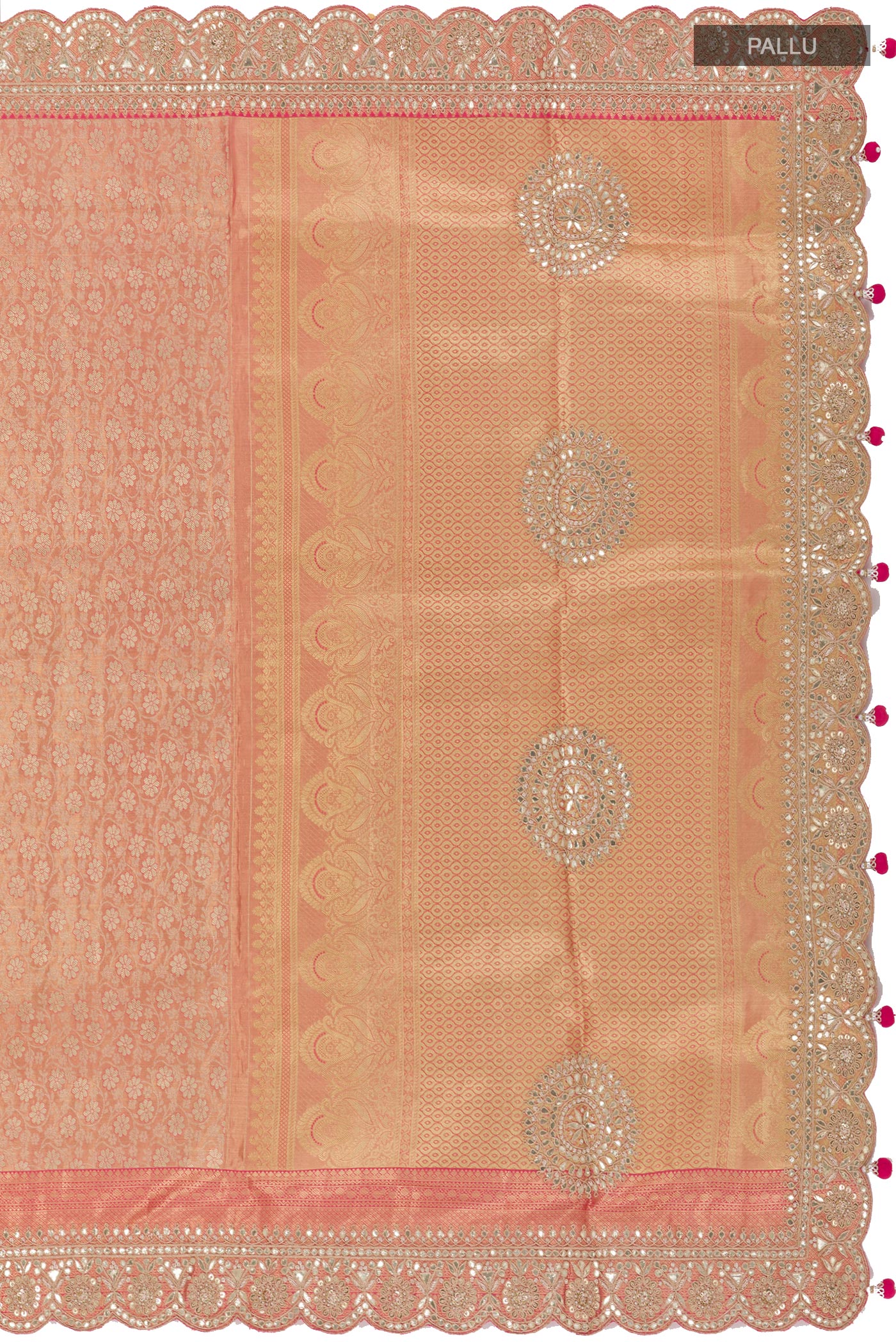 Close up image of the pallu of Rose Gold Tissue Silk Saree with Zari Brocade on the body and Embroidery Border. 