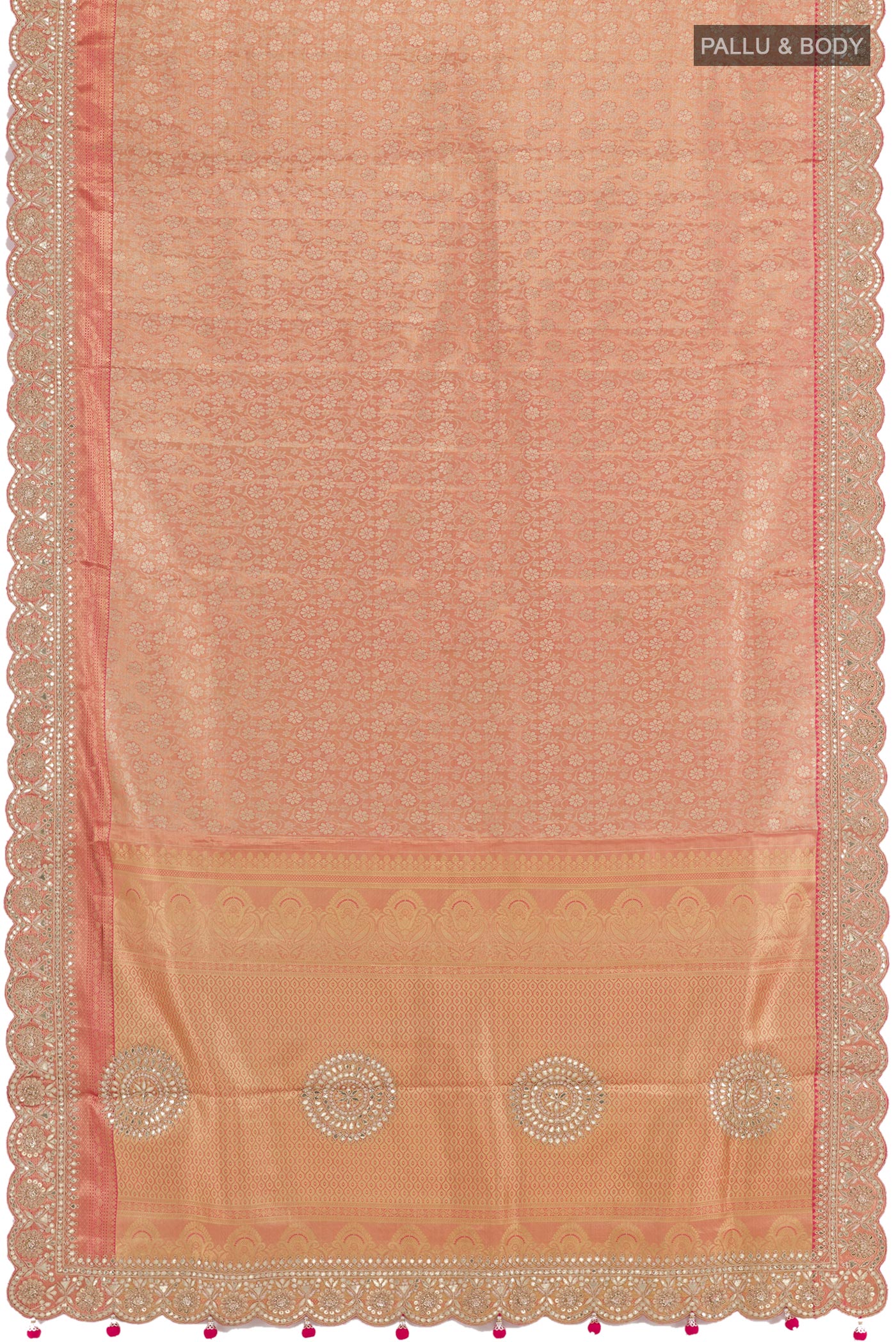 Flat view of Rose Gold Tissue Silk Saree with Zari Brocade on the body and Embroidery Border. 