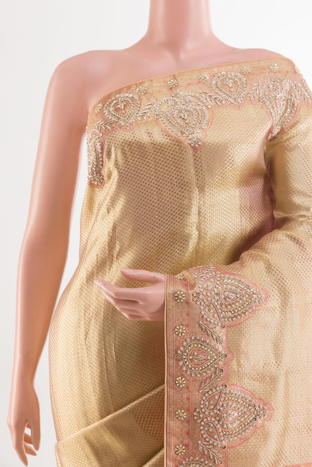 Border image of Golden Tissue Silk Saree with Zari Brocade on the body and Embroidery Border. 