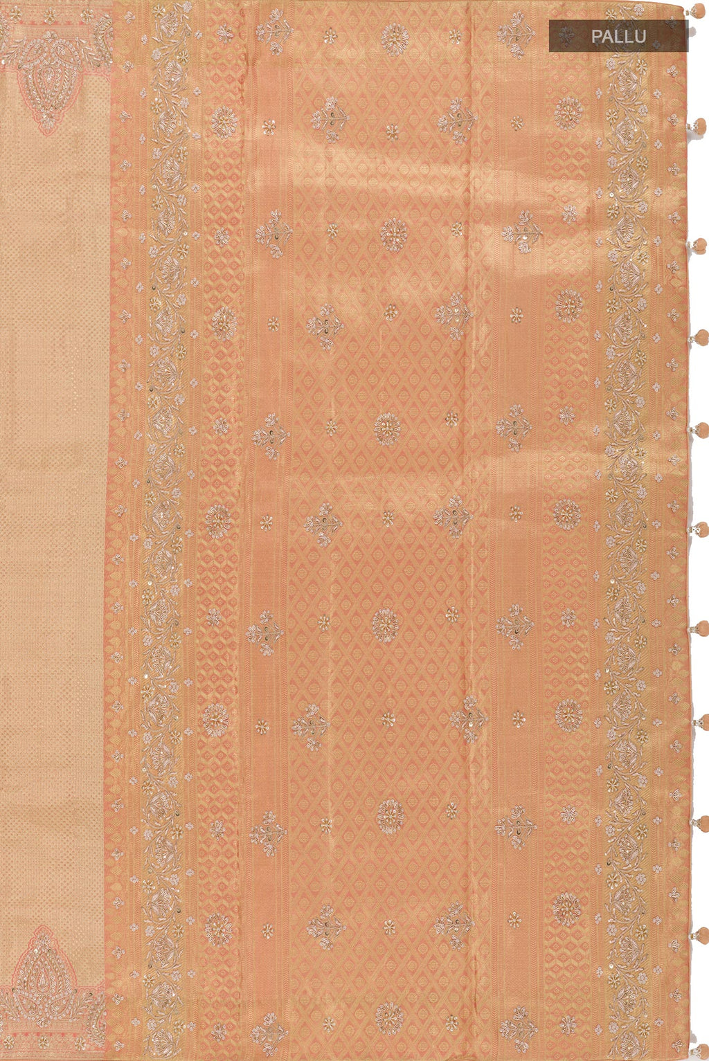 Close up image of the pallu of Golden Tissue Silk Saree with Zari Brocade on the body and Embroidery Border. 