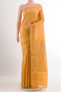 Yellow Tussar Silk Saree with Zari Butta on the body and Zari Border.  displayed on a mannequin