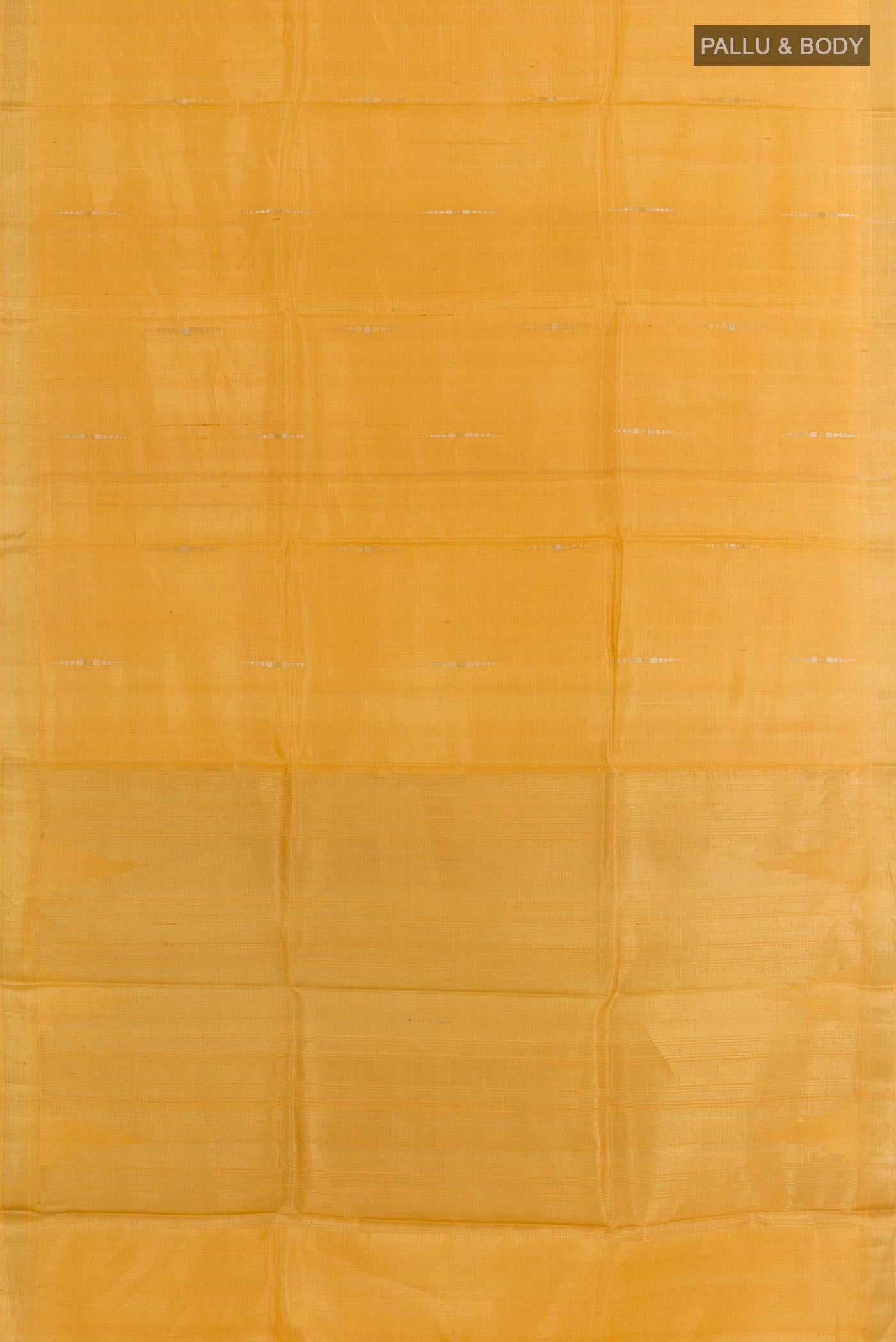 Flat view of Yellow Tussar Silk Saree with Zari Butta on the body and Zari Border. 