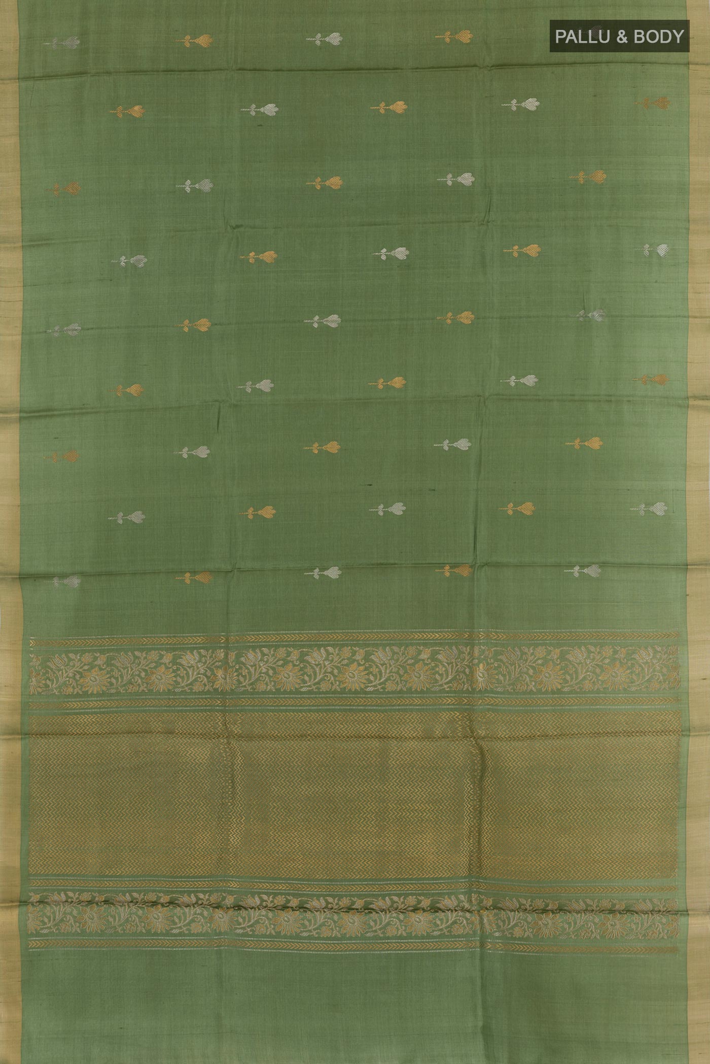 Flat view of Green Tussar Silk Saree with Zari Butta on the body and Zari Border. 