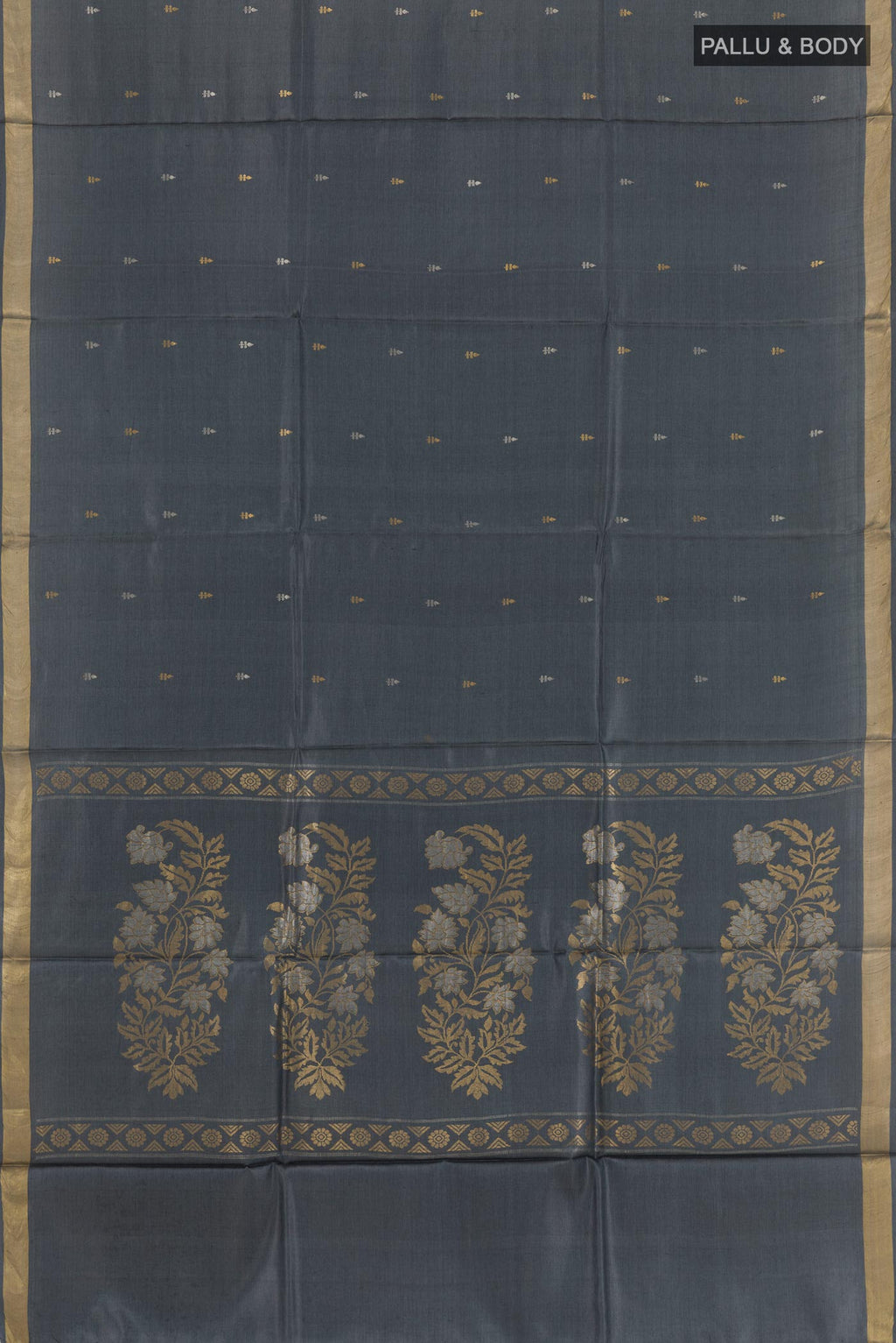 Flat view of Grey Tussar Silk Saree with Zari Butta on the body and Zari Border. 