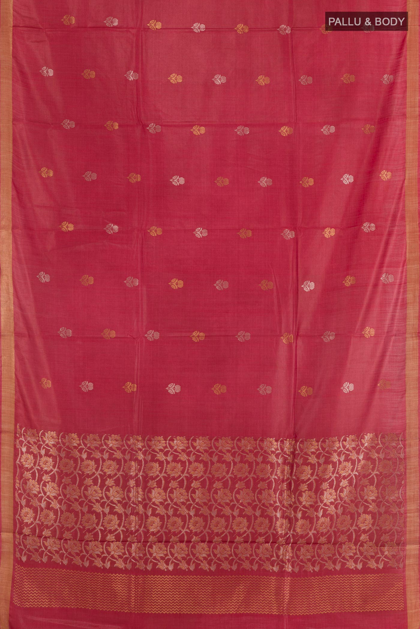 Flat view of Maroon Tussar Silk Saree with Zari Butta on the body and Zari Border. 