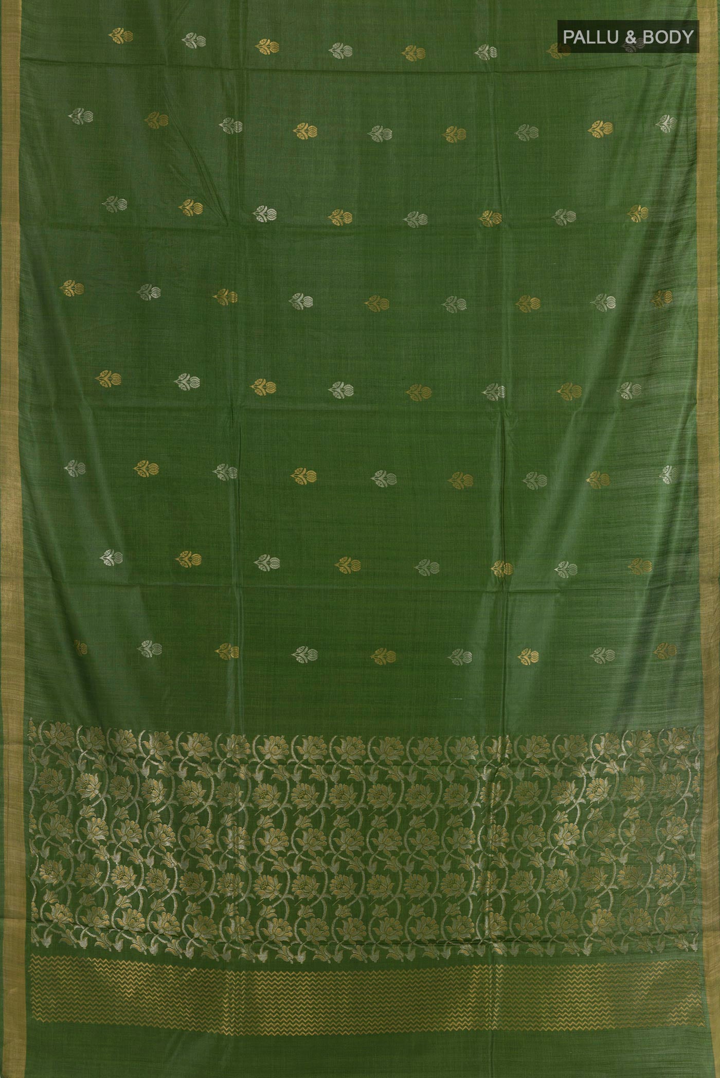 Flat view of Green Tussar Silk Saree with Zari Butta on the body and Zari Border. 