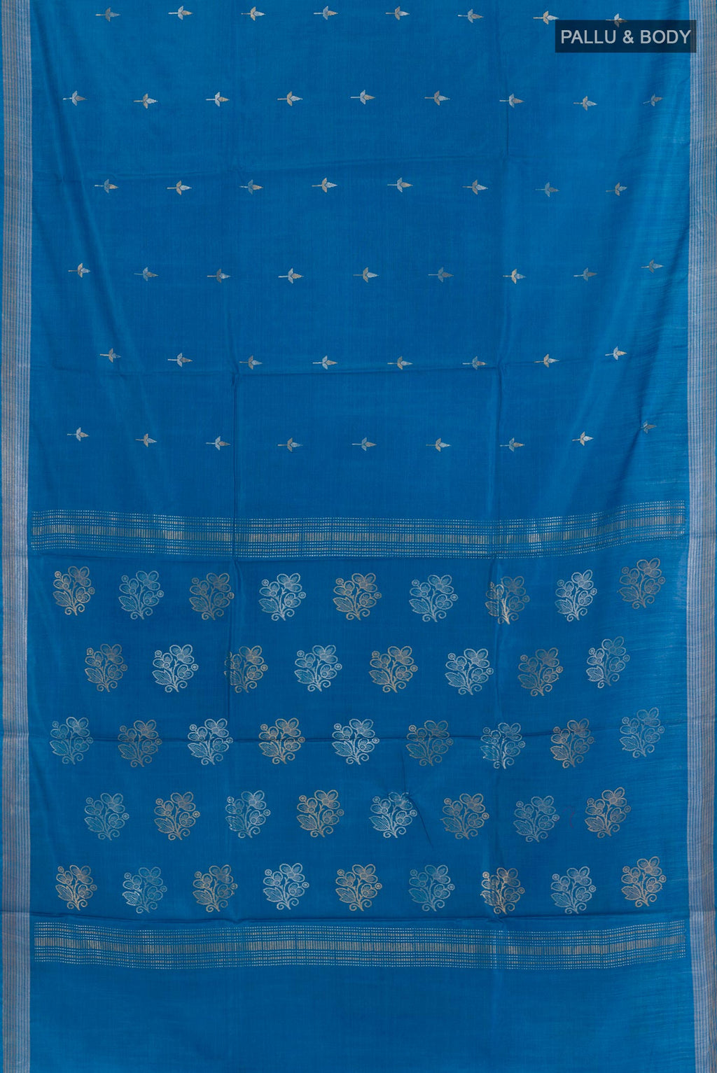 Flat view of Blue Tussar Silk Saree with Zari Butta on the body and Zari Border. 