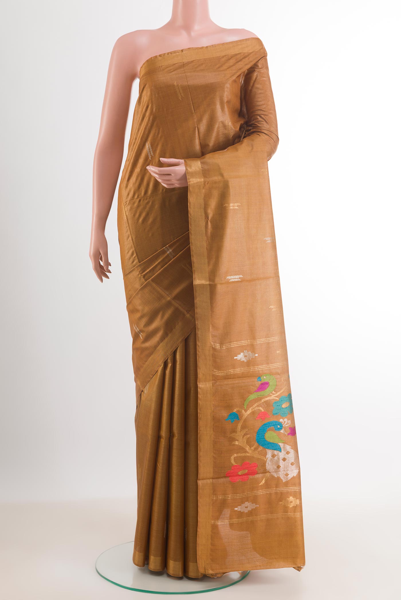 Mustard Tussar Silk Saree with Zari Butta on the body and Zari Border.  displayed on a mannequin
