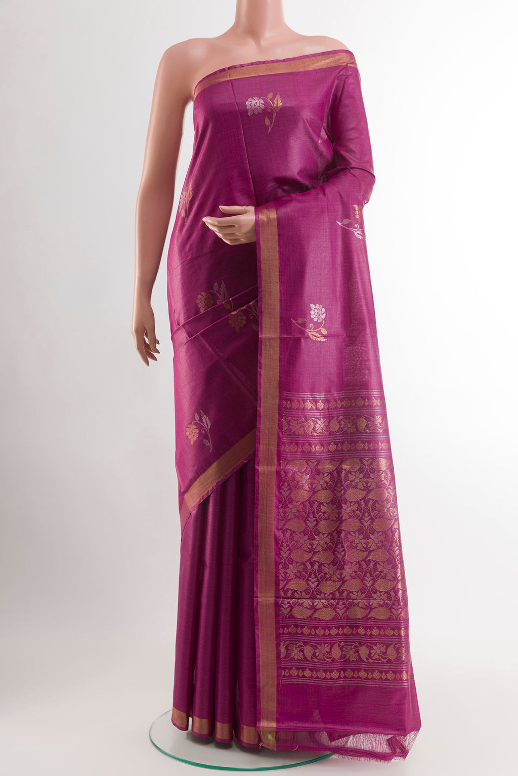 Purple Tussar Saree with Zari Butta on the body and Zari Border.  displayed on a mannequin