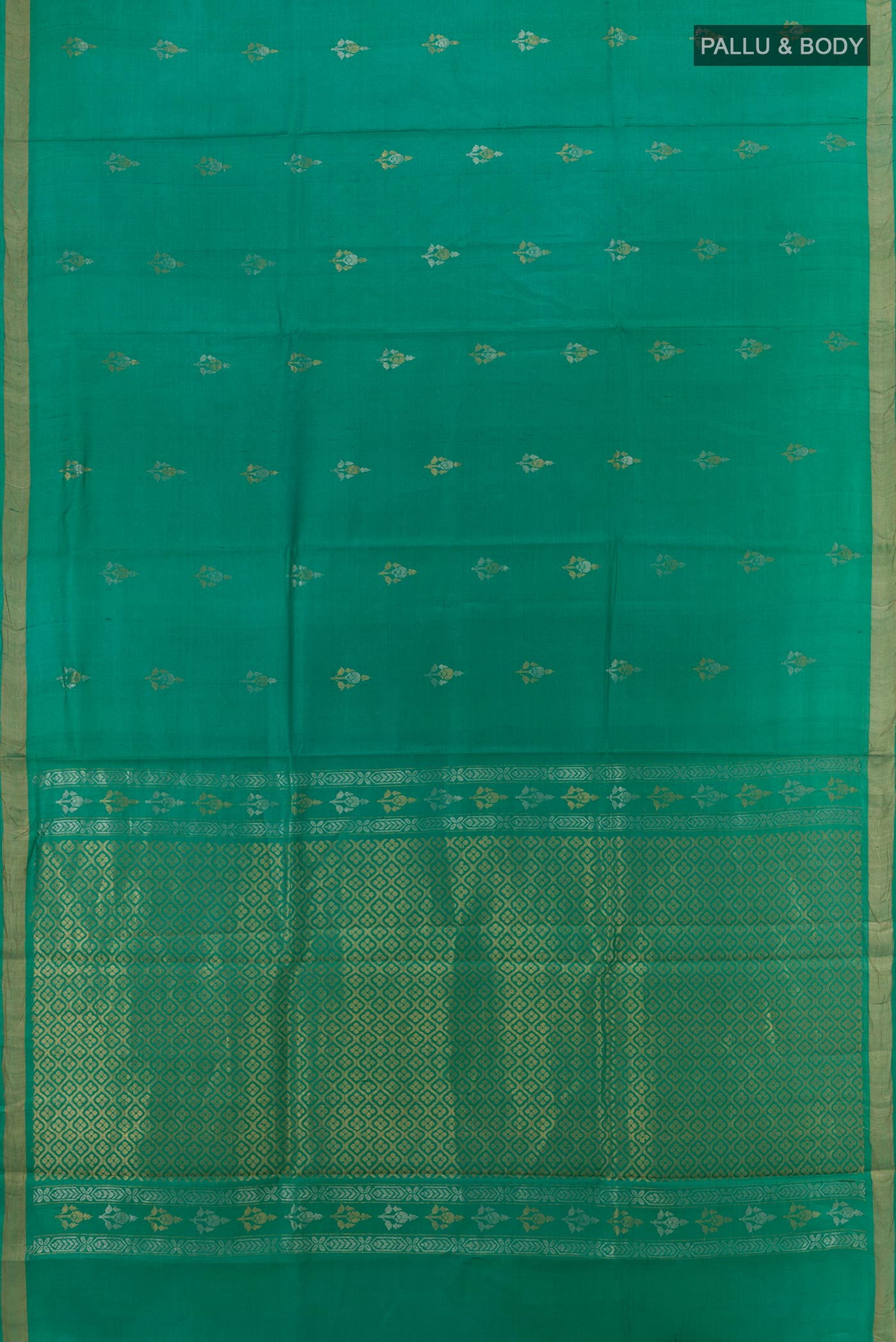 Flat view of Green Tussar Silk Saree with Zari Butta on the body and Zari Border. 