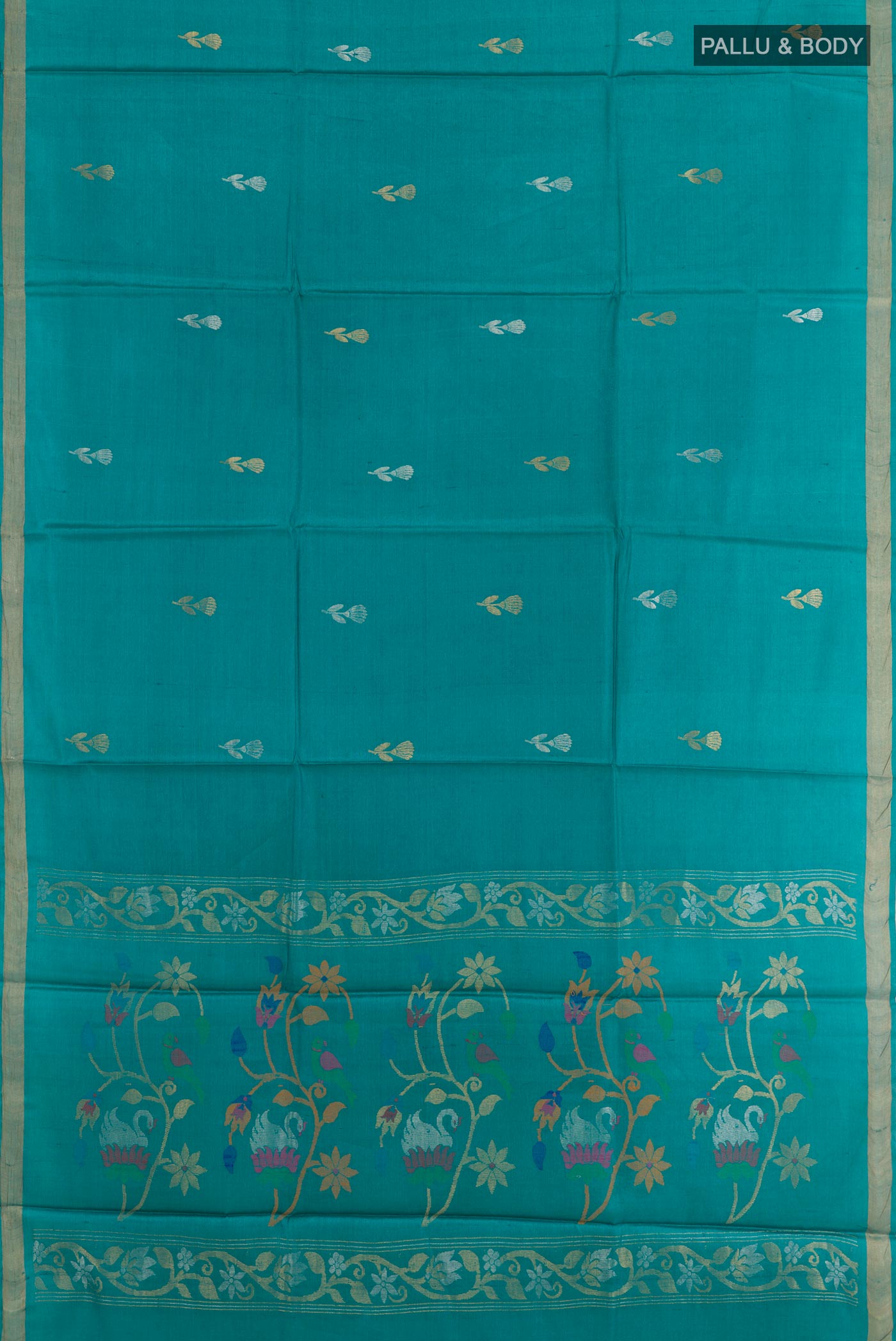 Flat view of Blue Tussar Silk Saree with Zari Butta on the body and Zari Border. 