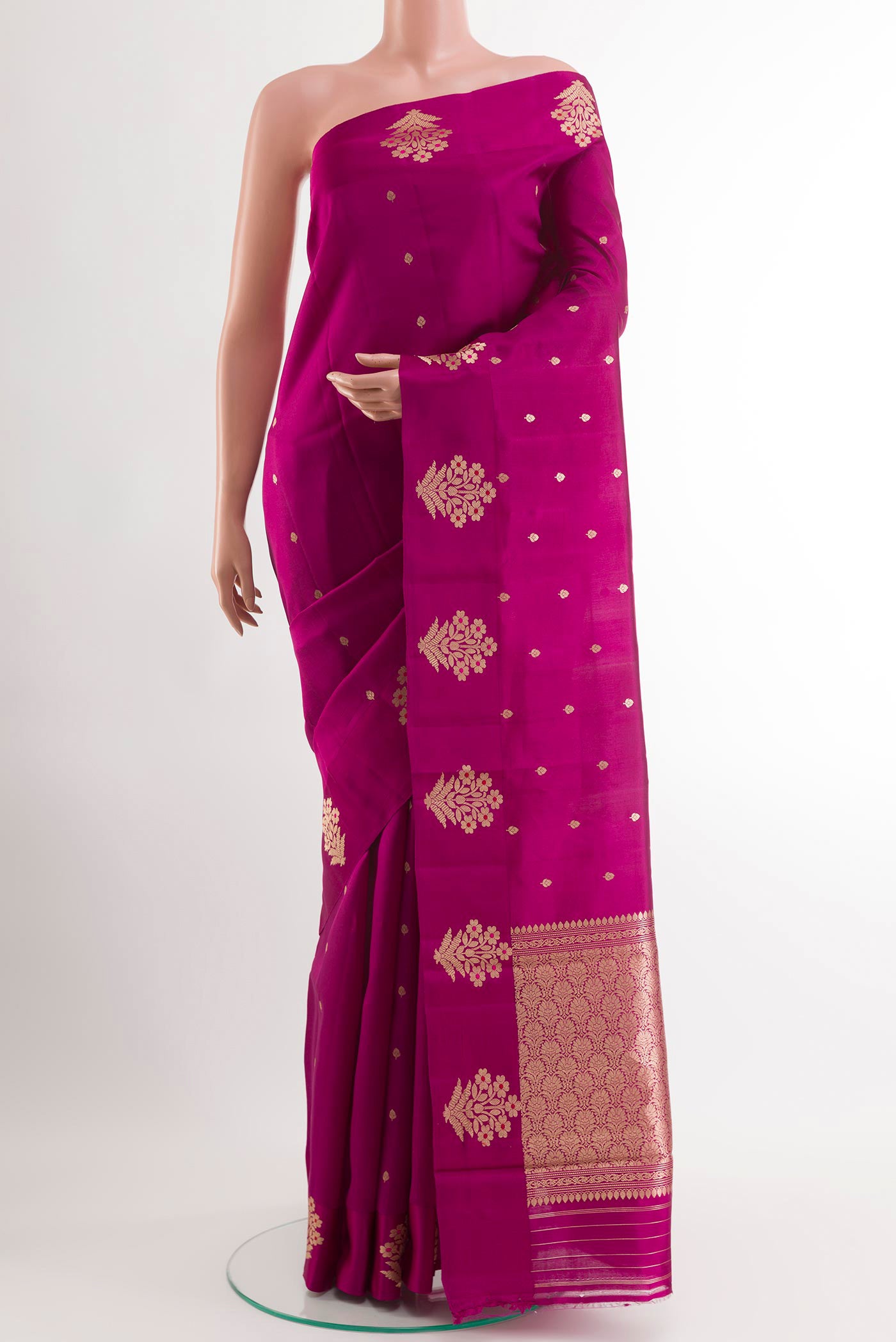 Purple Banarasi Katan Silk Saree with Zari Butta on the body and Zari Border.  displayed on a mannequin