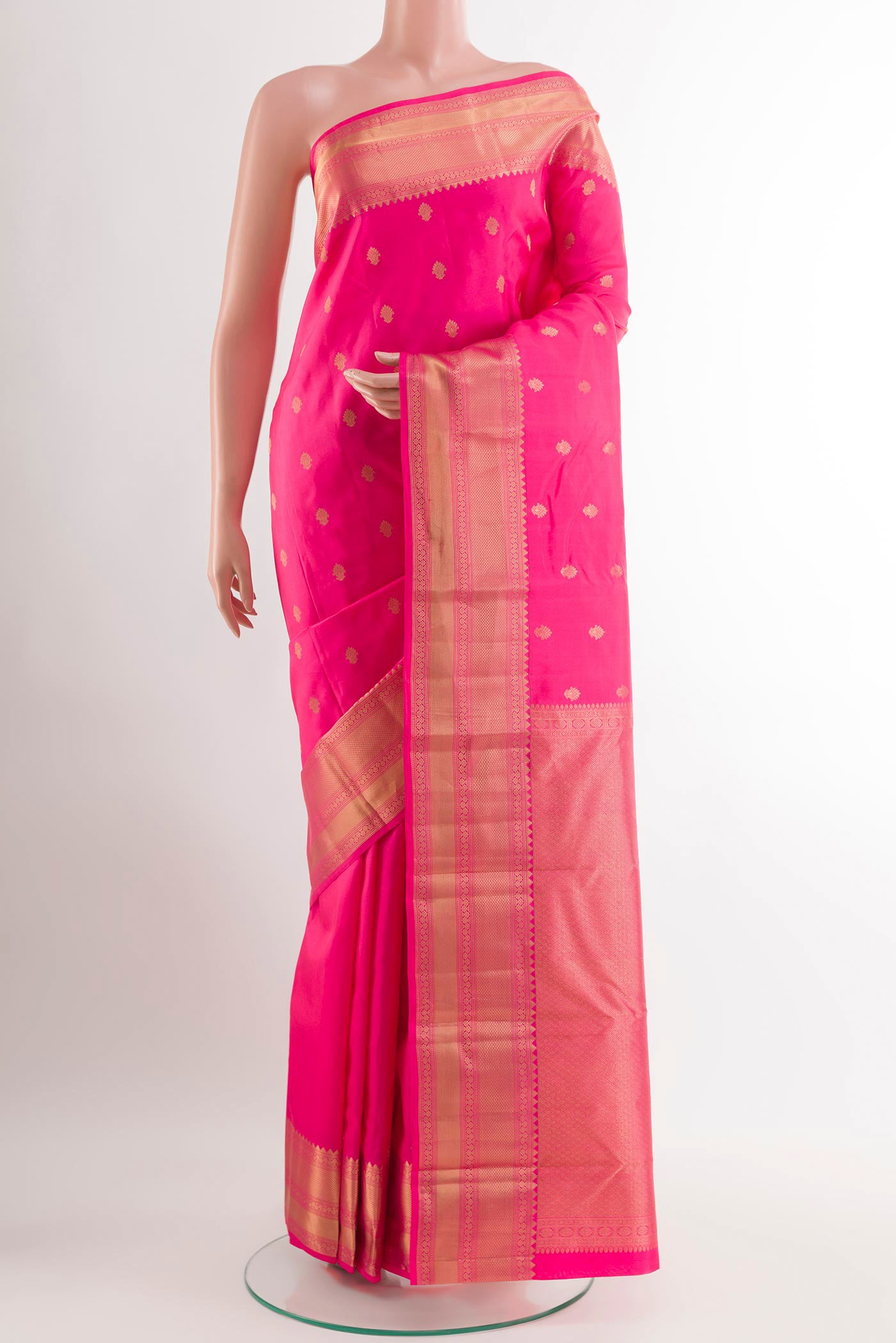 Pink Dual Tone Kanchipuram Silk Saree with Zari Butta on the body and Zari Border.  displayed on a mannequin