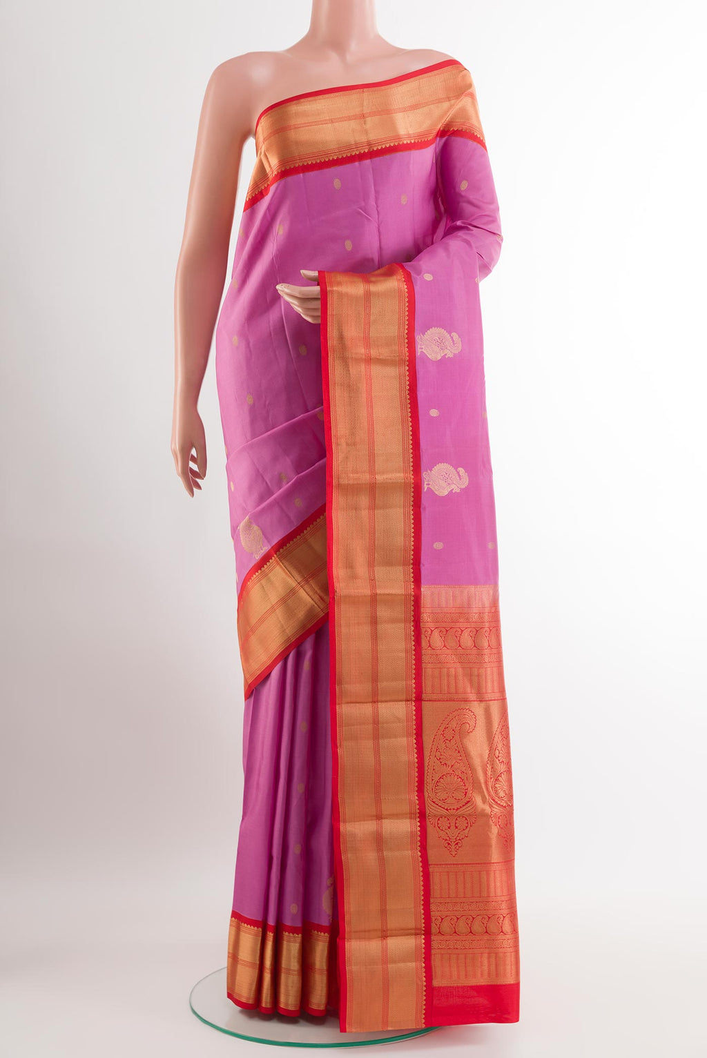 Lavender Kanchipuram Silk Saree with Zari Butta on the body and Zari Border.  displayed on a mannequin