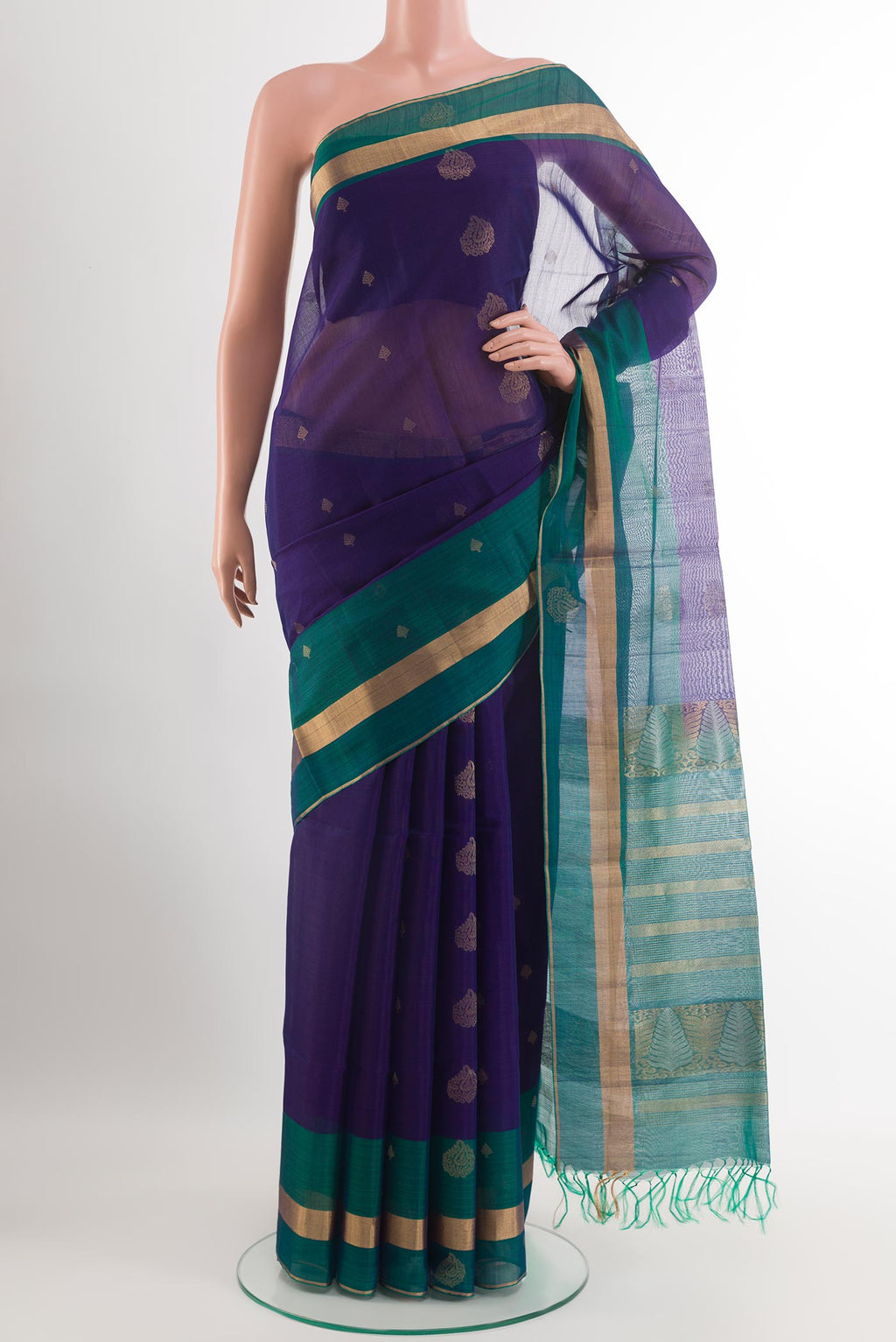 Blue Blended Kora Cotton Saree with Zari Butta on the body and Zari Border.  displayed on a mannequin
